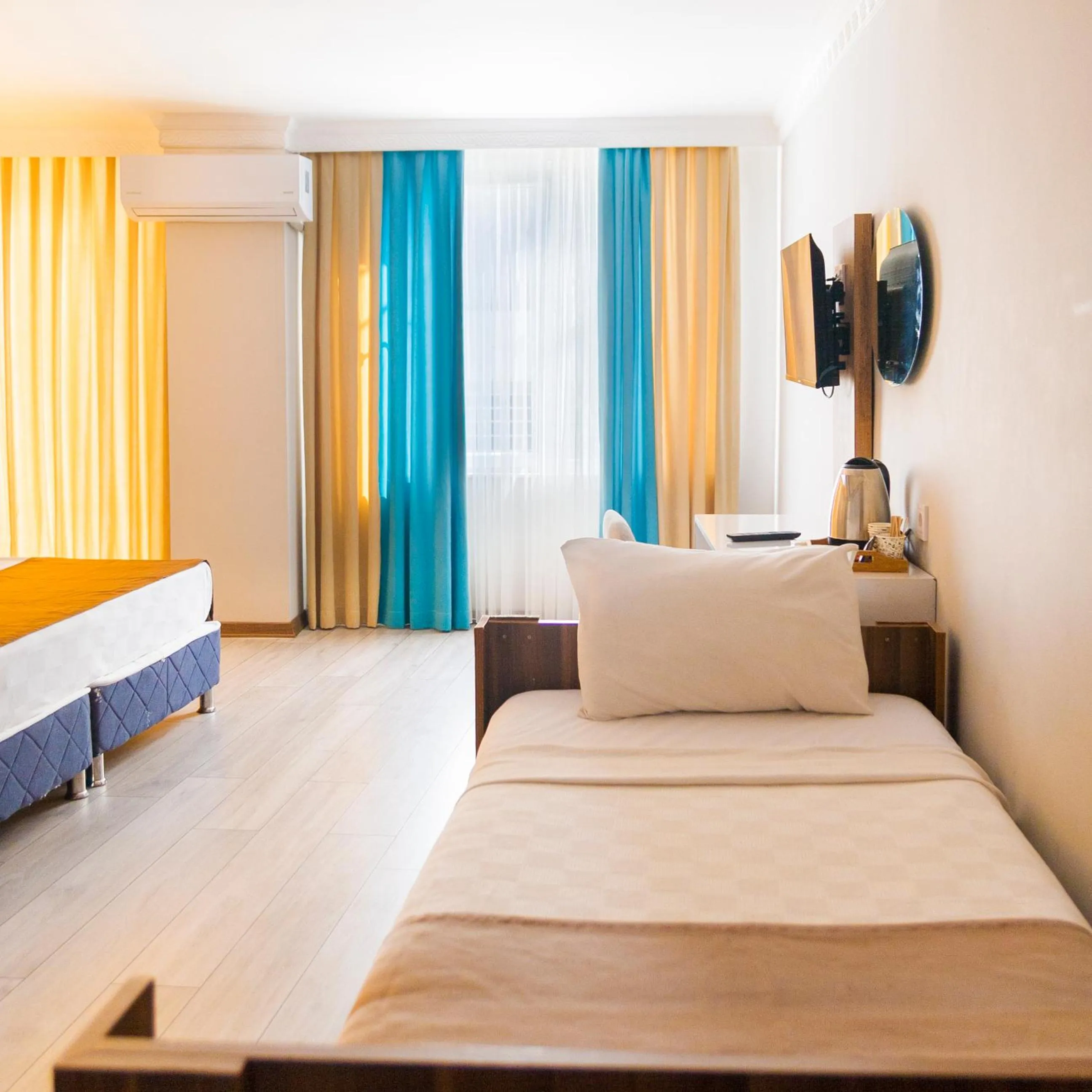 Bed in PRIVADO HOTELS