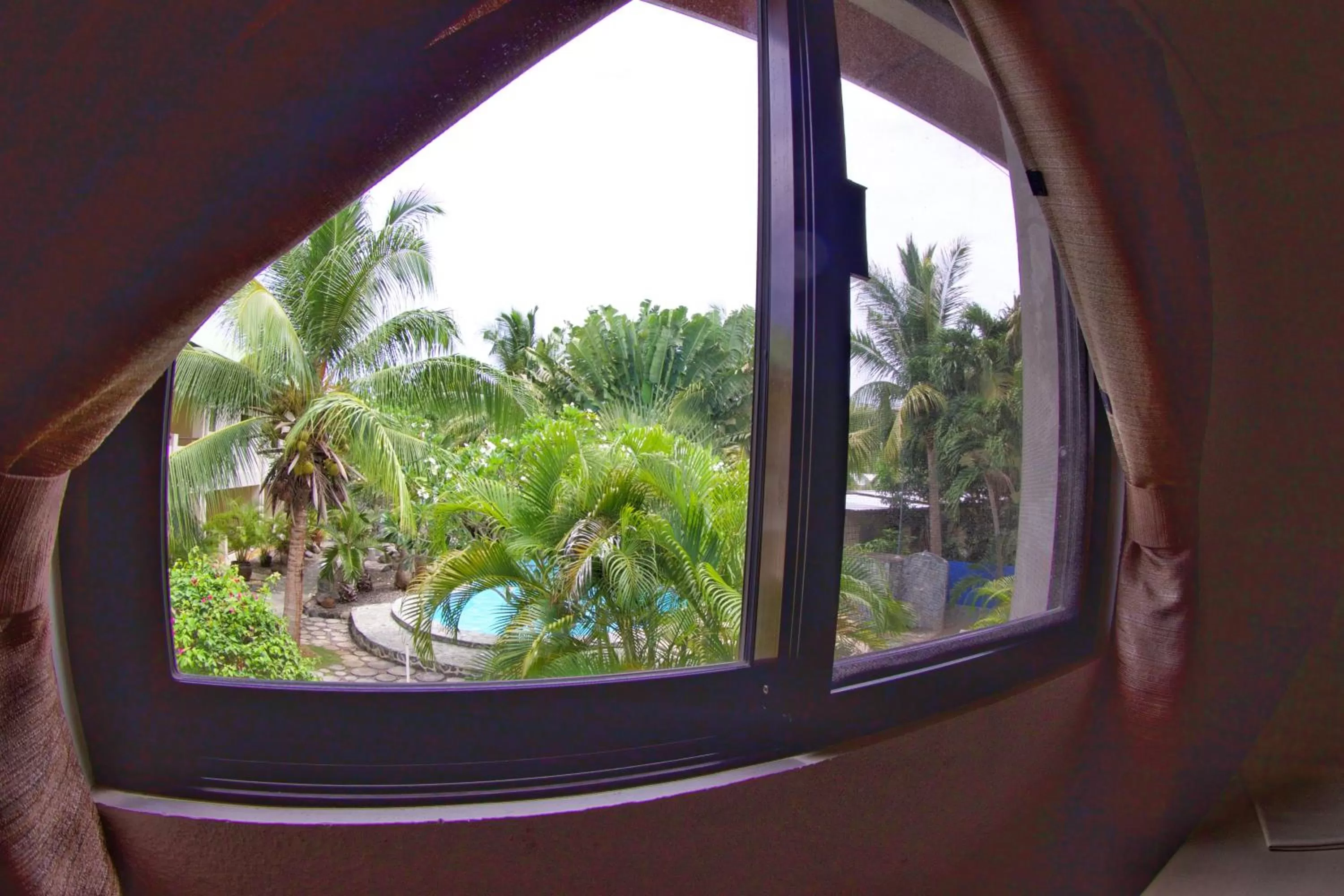 Bedroom in Alona Swiss Resort