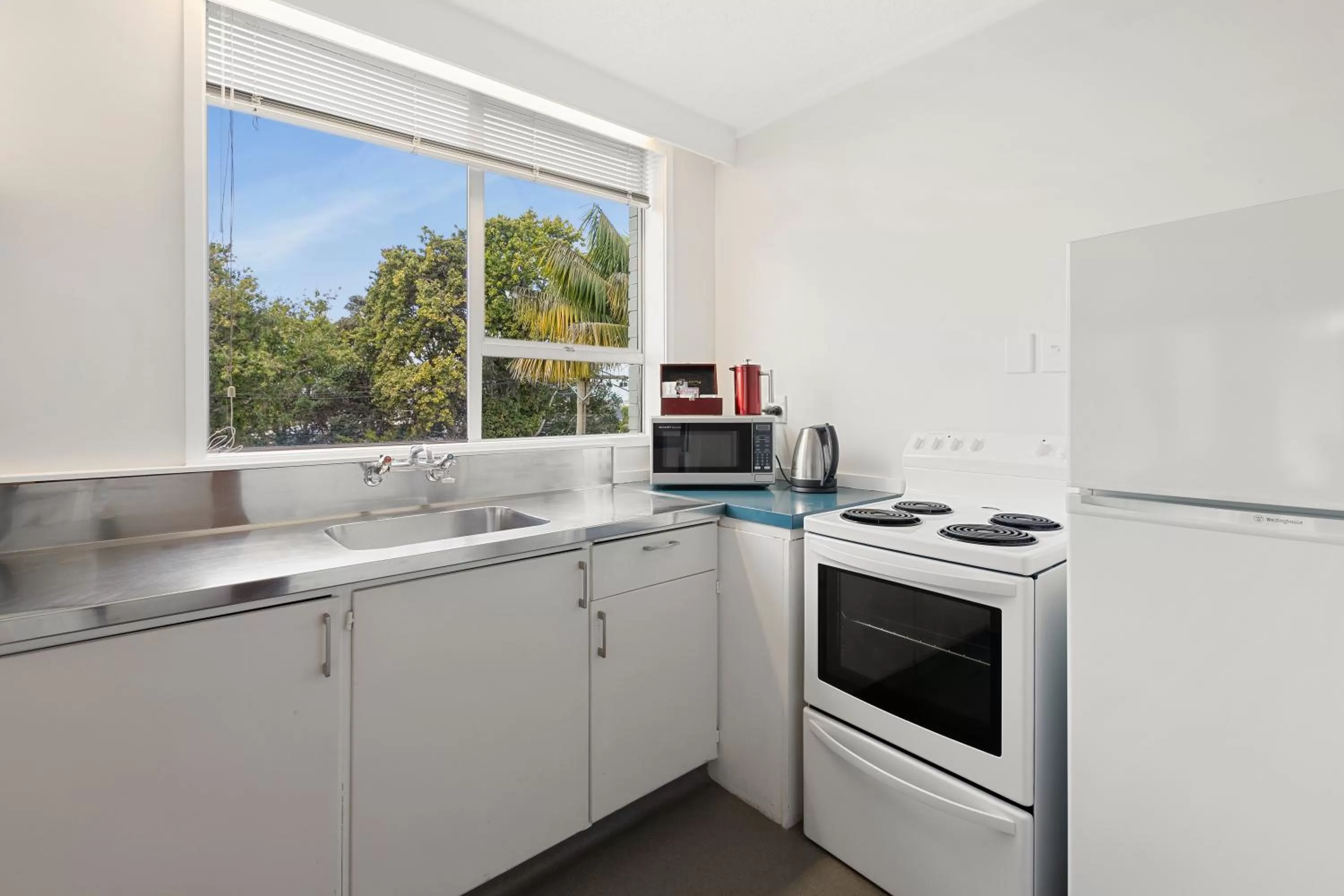 Kitchen or kitchenette in The Parnell Hotel & Conference Centre