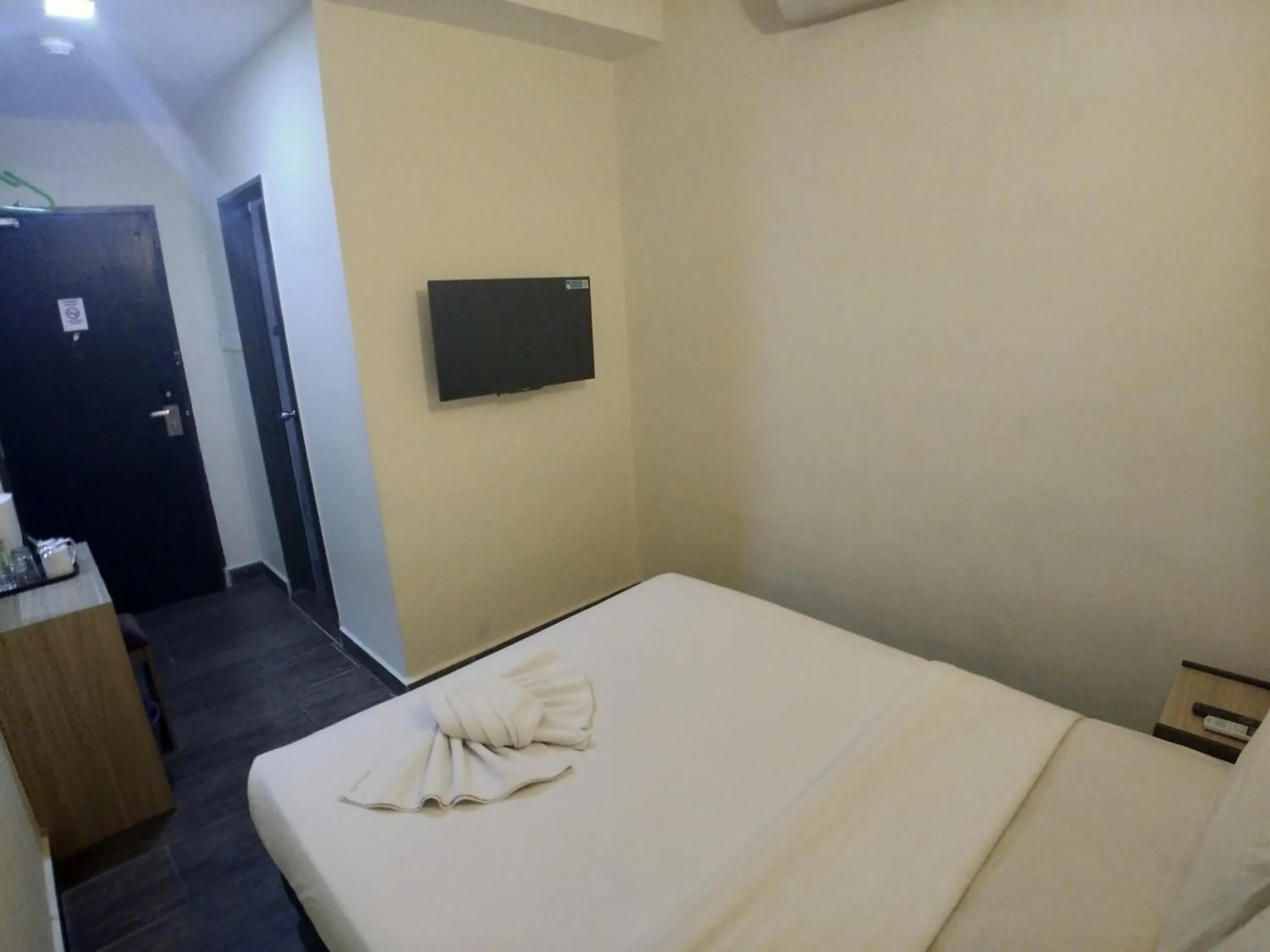 Communal lounge/ TV room, Bed in Hotel Westree KL Sentral