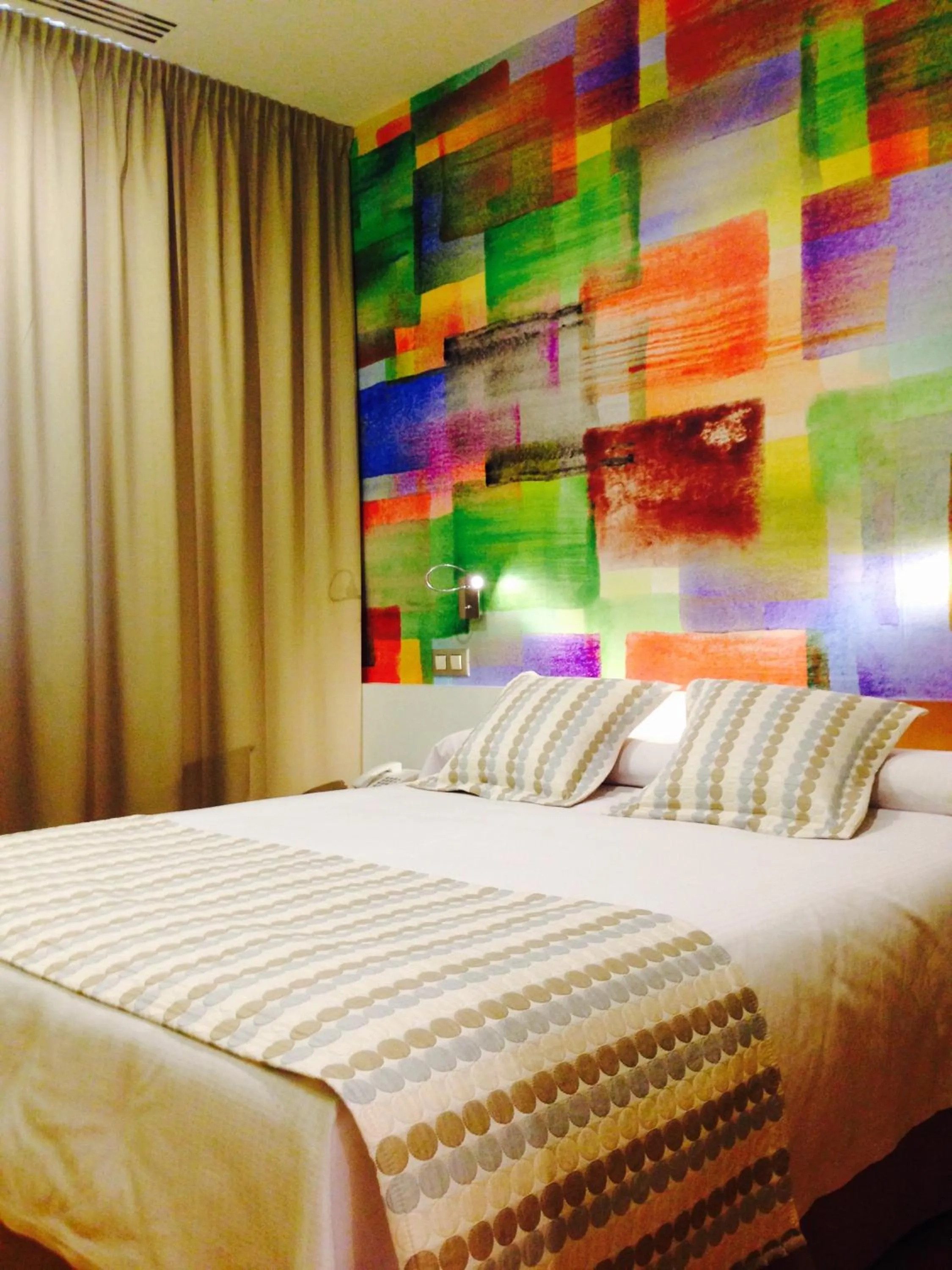 Decorative detail, Bed in Hotel Boutique Museo Burgos