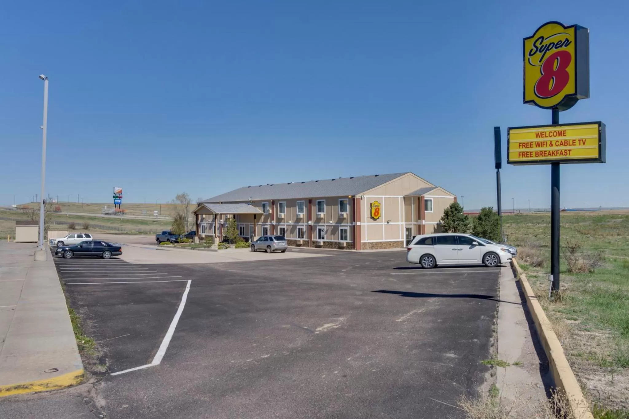 Property logo or sign in Super 8 by Wyndham Limon