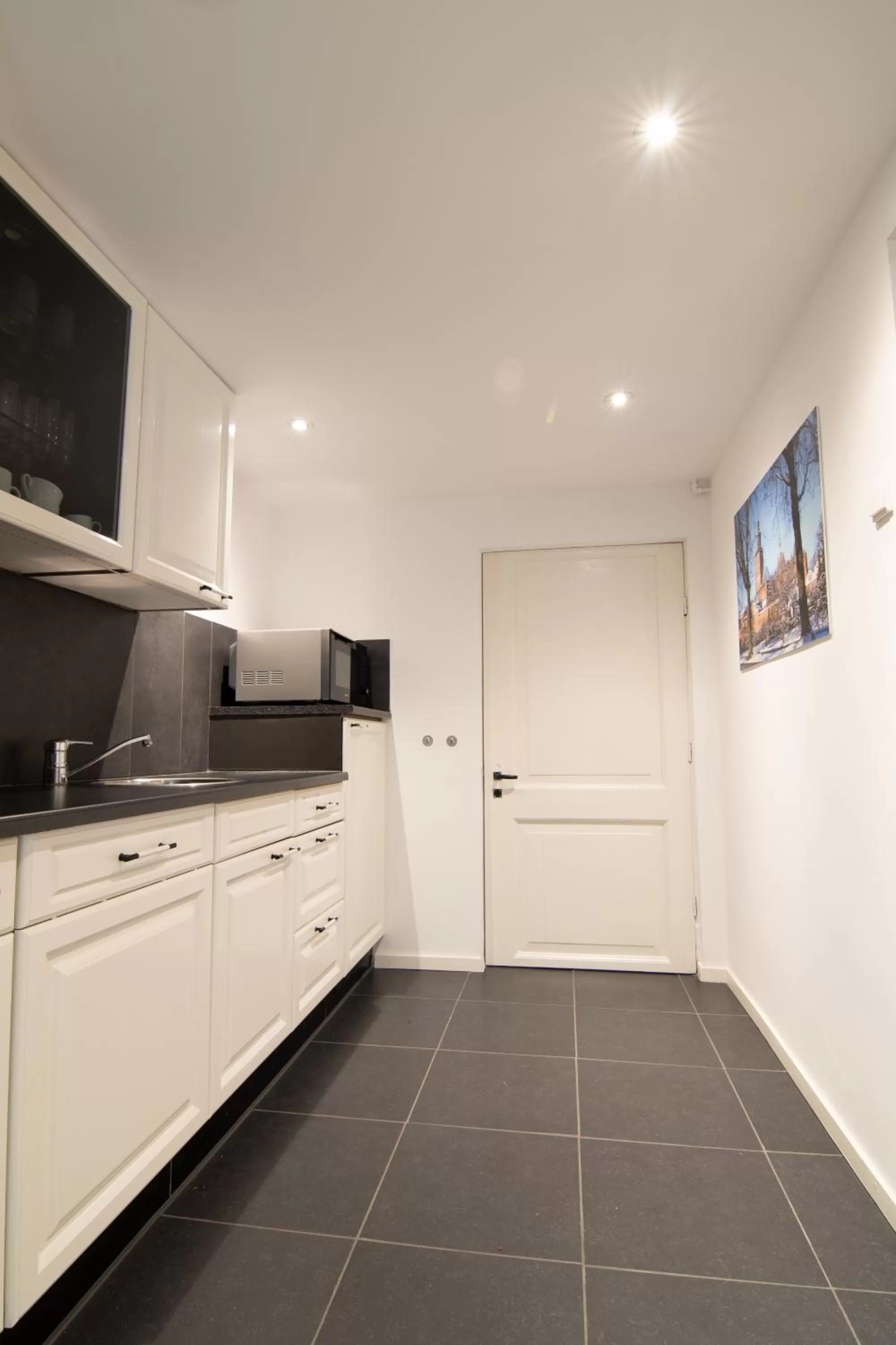 Kitchen or kitchenette in B&B Bed & Sauna