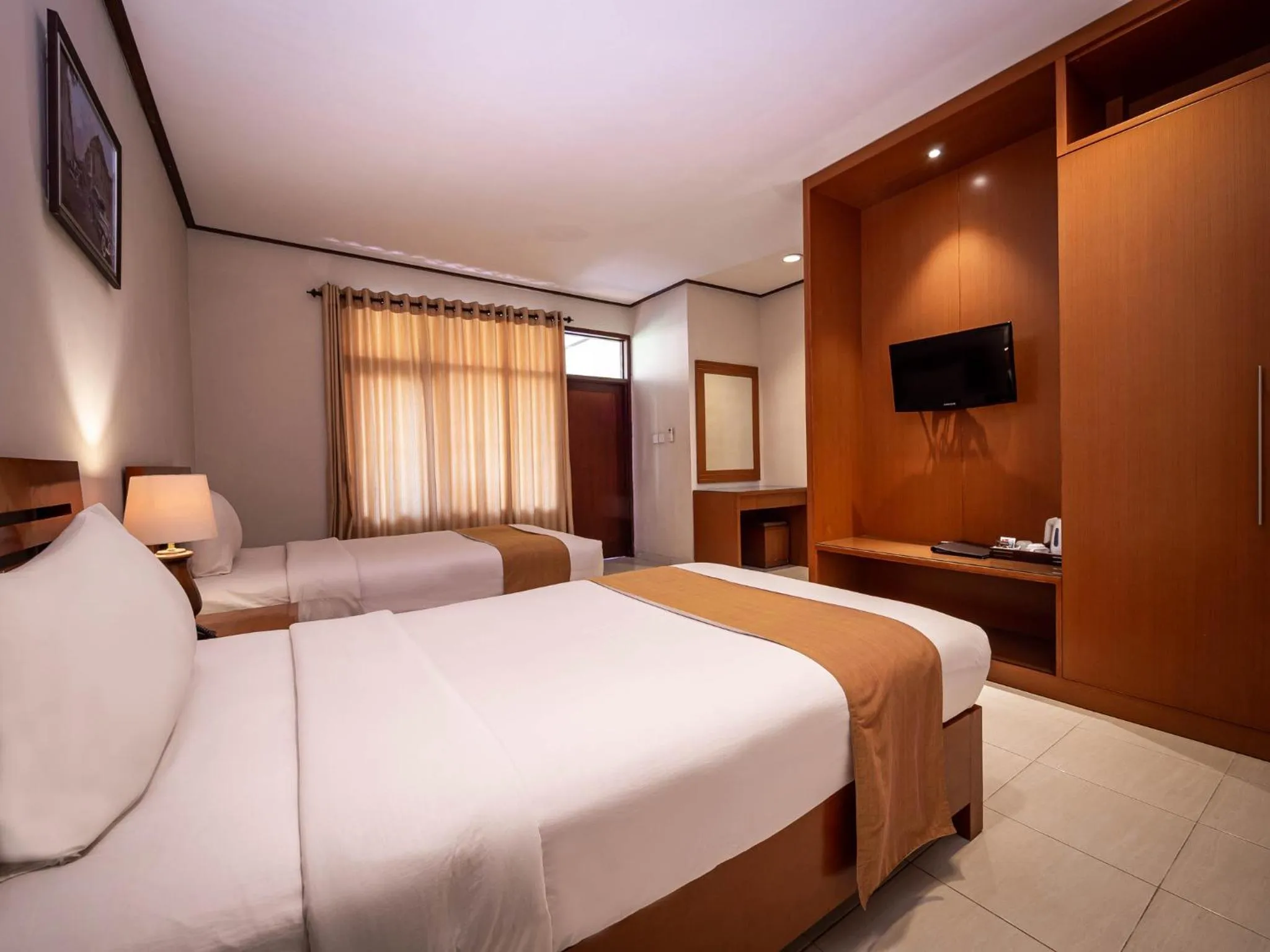 Garden, Bed in Yulia Beach Inn Kuta