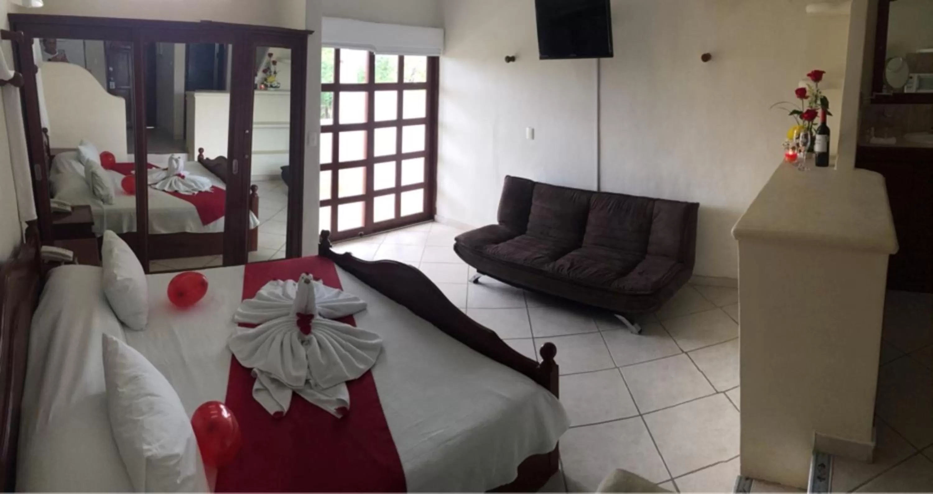 Bedroom, Bed in Villas Coco Resort - All Suites