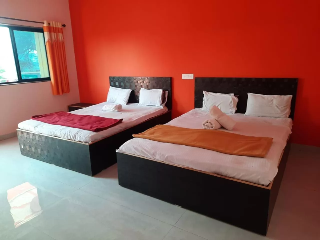 Bed in Hotel Nisarg Lodging And Restaurant