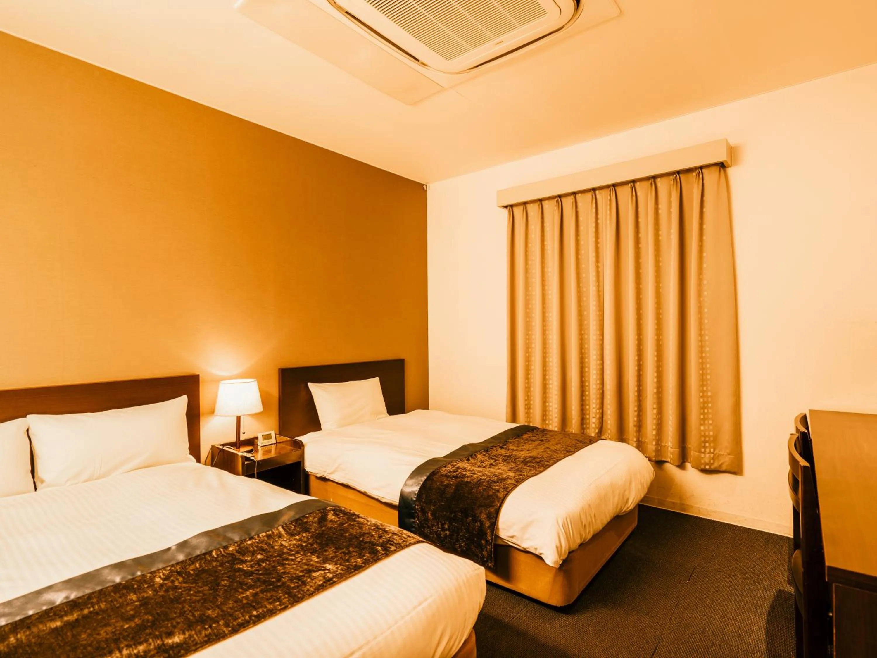 Photo of the whole room, Bed in Hotel AreaOne Takamatsu