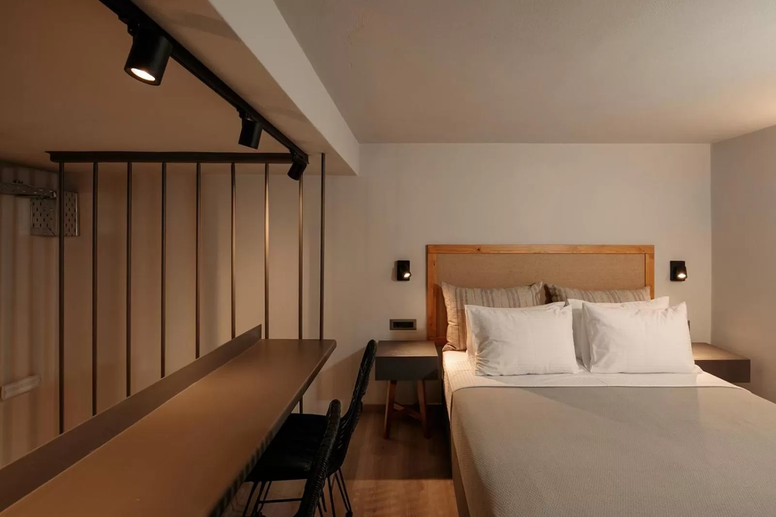 Bed in "Makava Suites" Your Luxe Urban Sanctuary