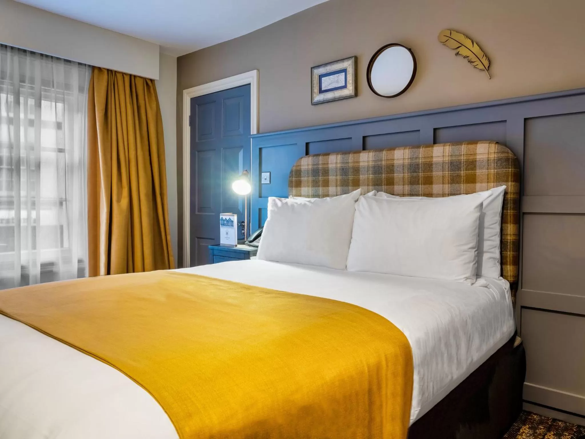 Bed in The Feathers Hotel