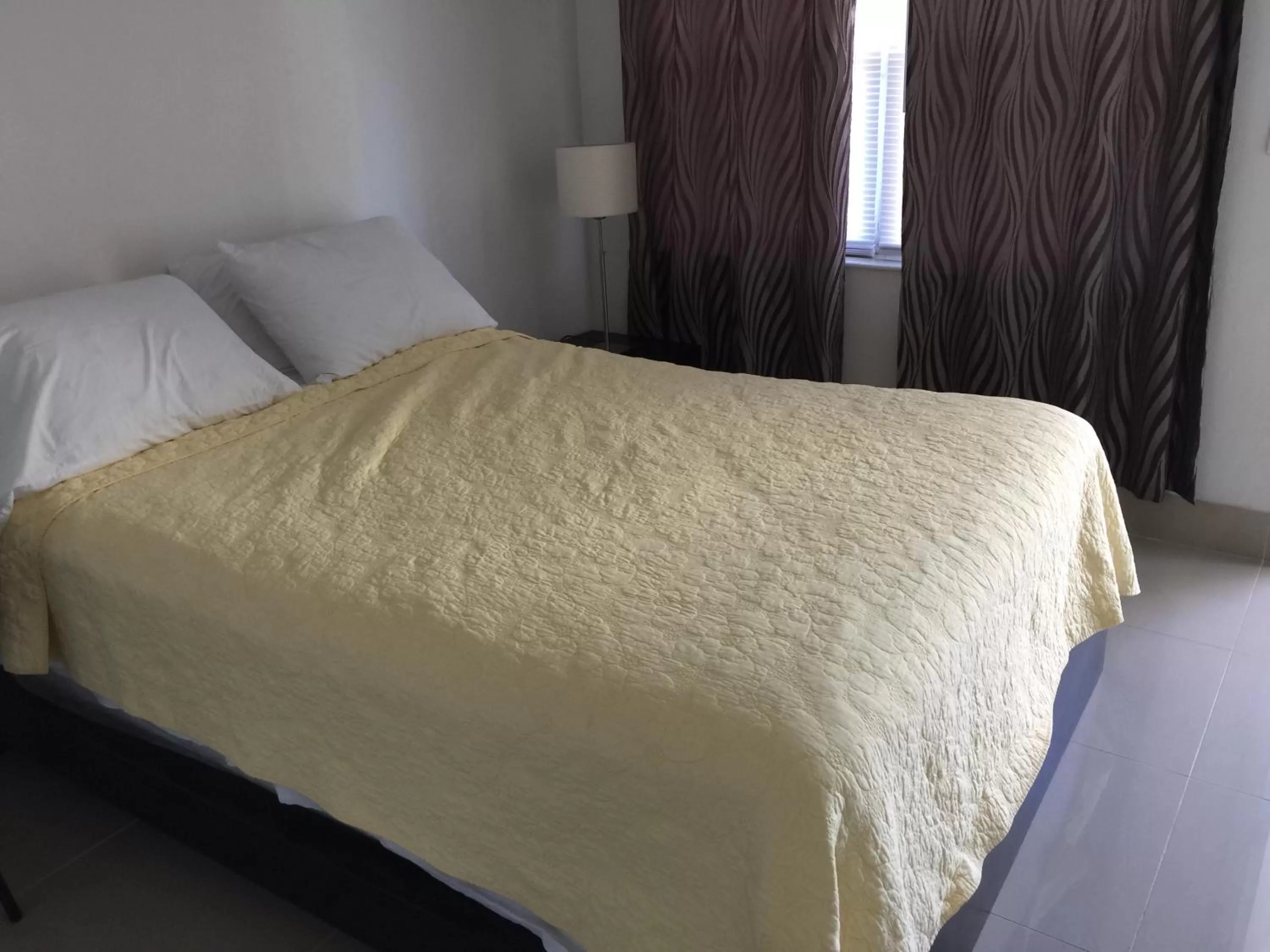 Bed in Pelican By The Sea