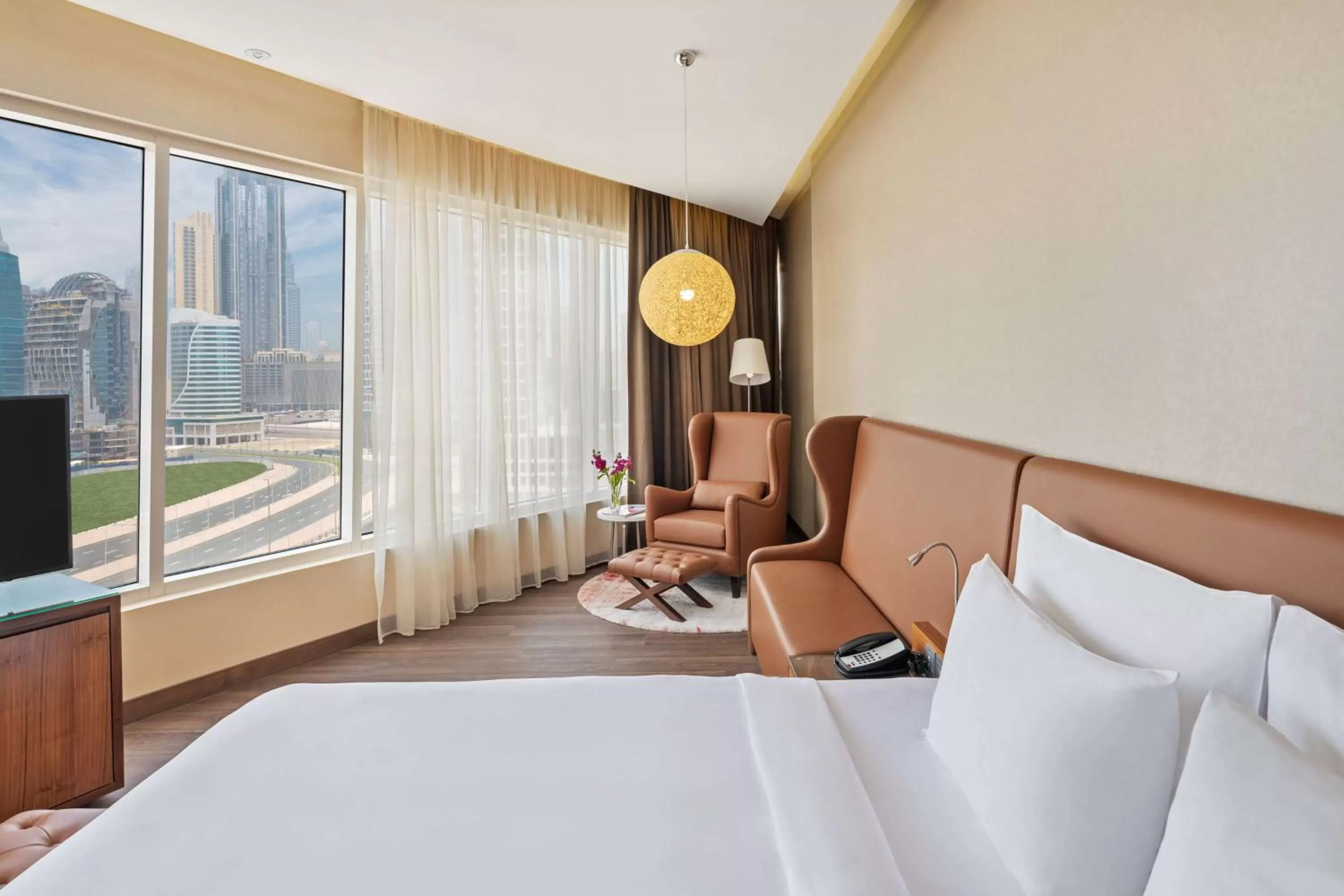 Photo of the whole room, Bed in Radisson Blu Hotel, Dubai Canal View