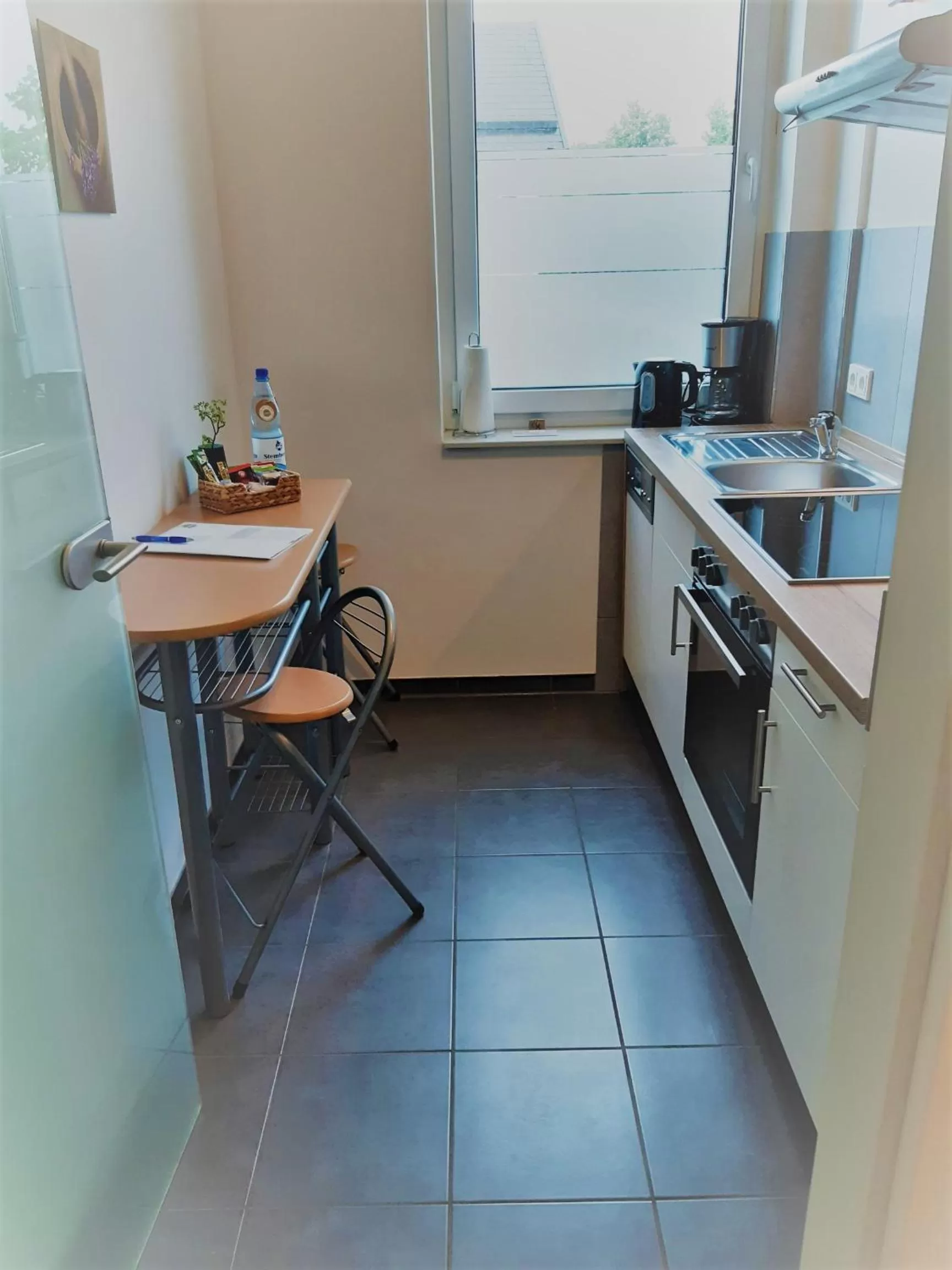 Dining area in Hotel M24 - Alle Zimmer mit Küchenzeile