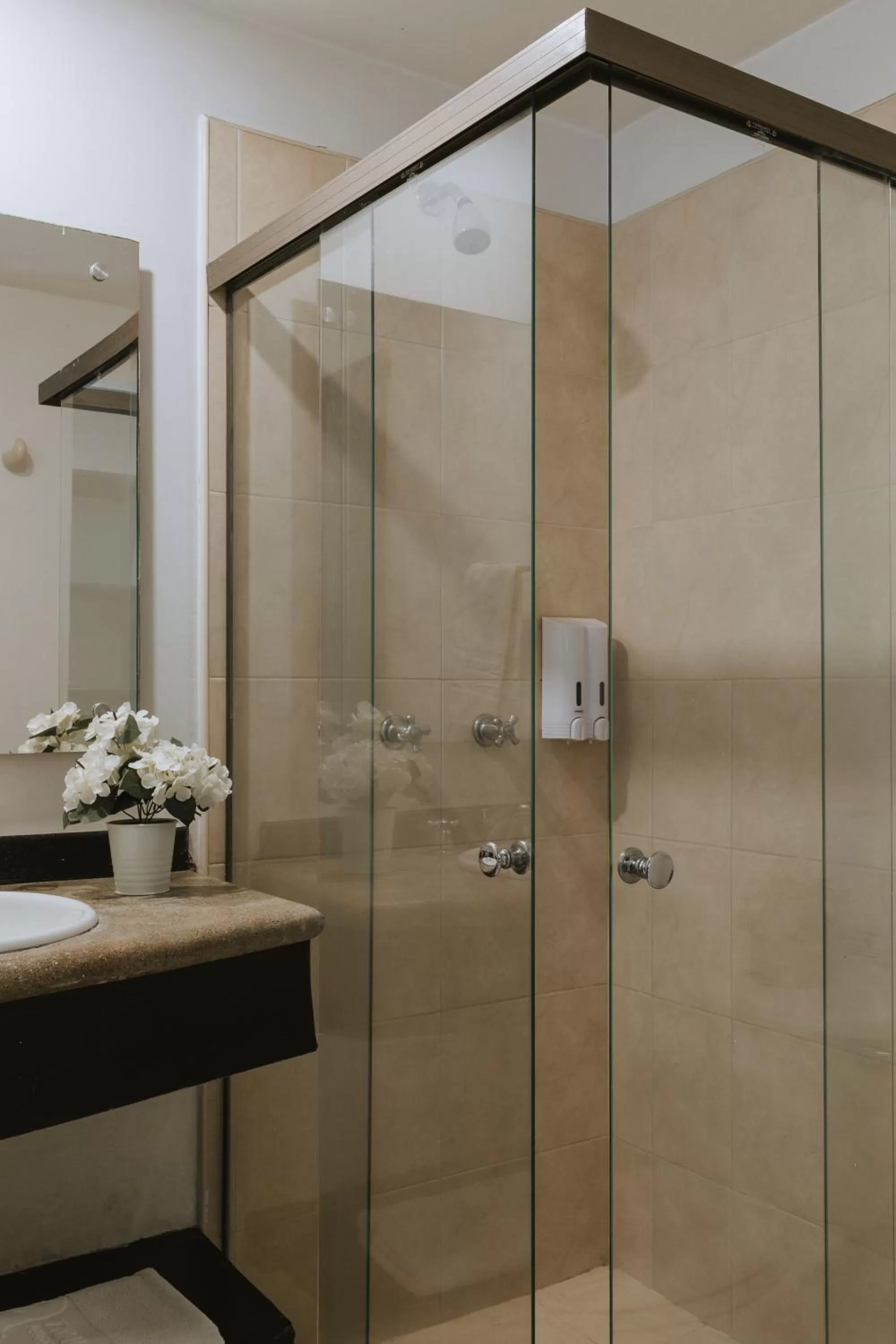 Bathroom in Travelers Orange Suites