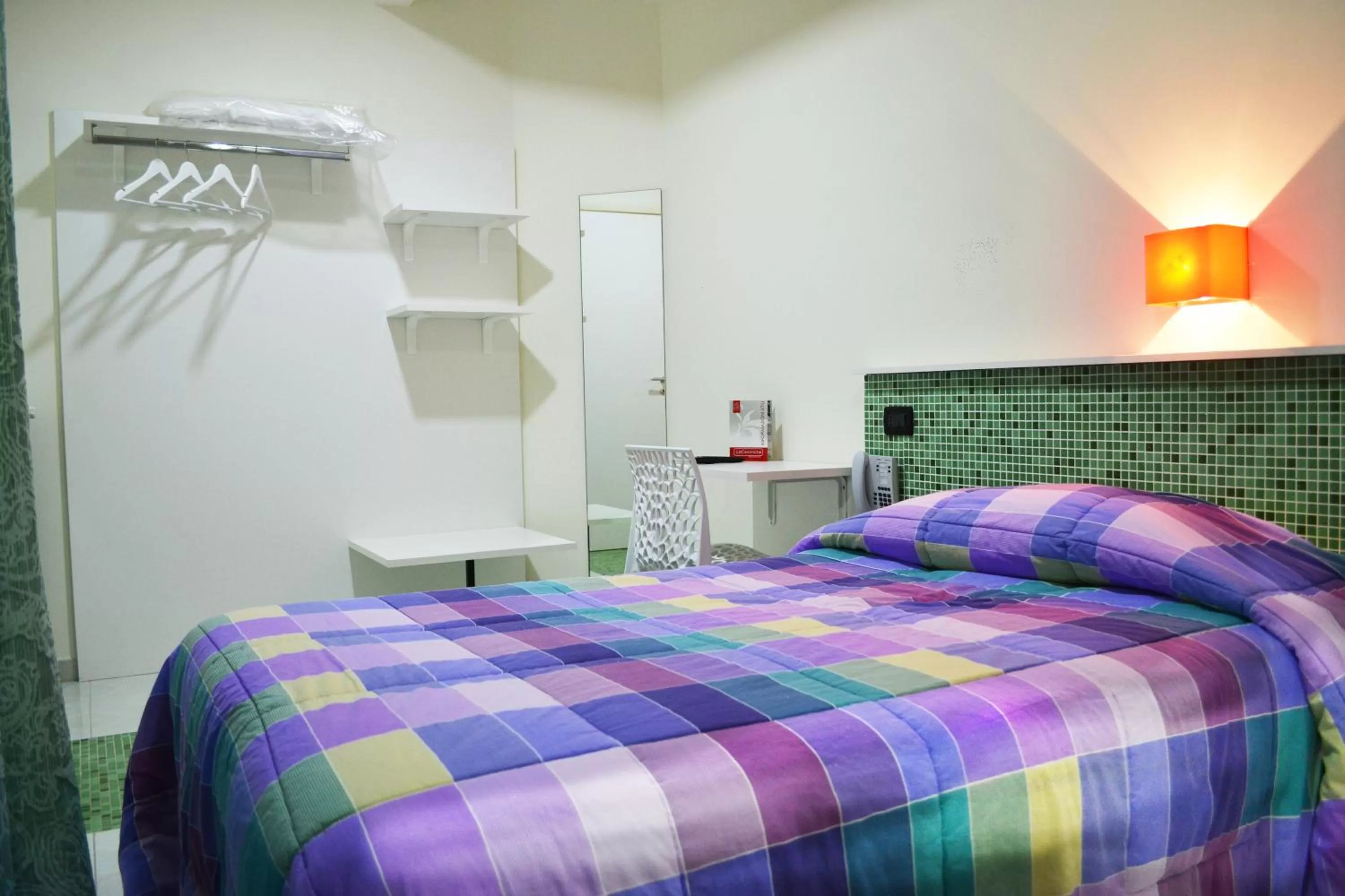 Bed in Hotel Le Ceramiche