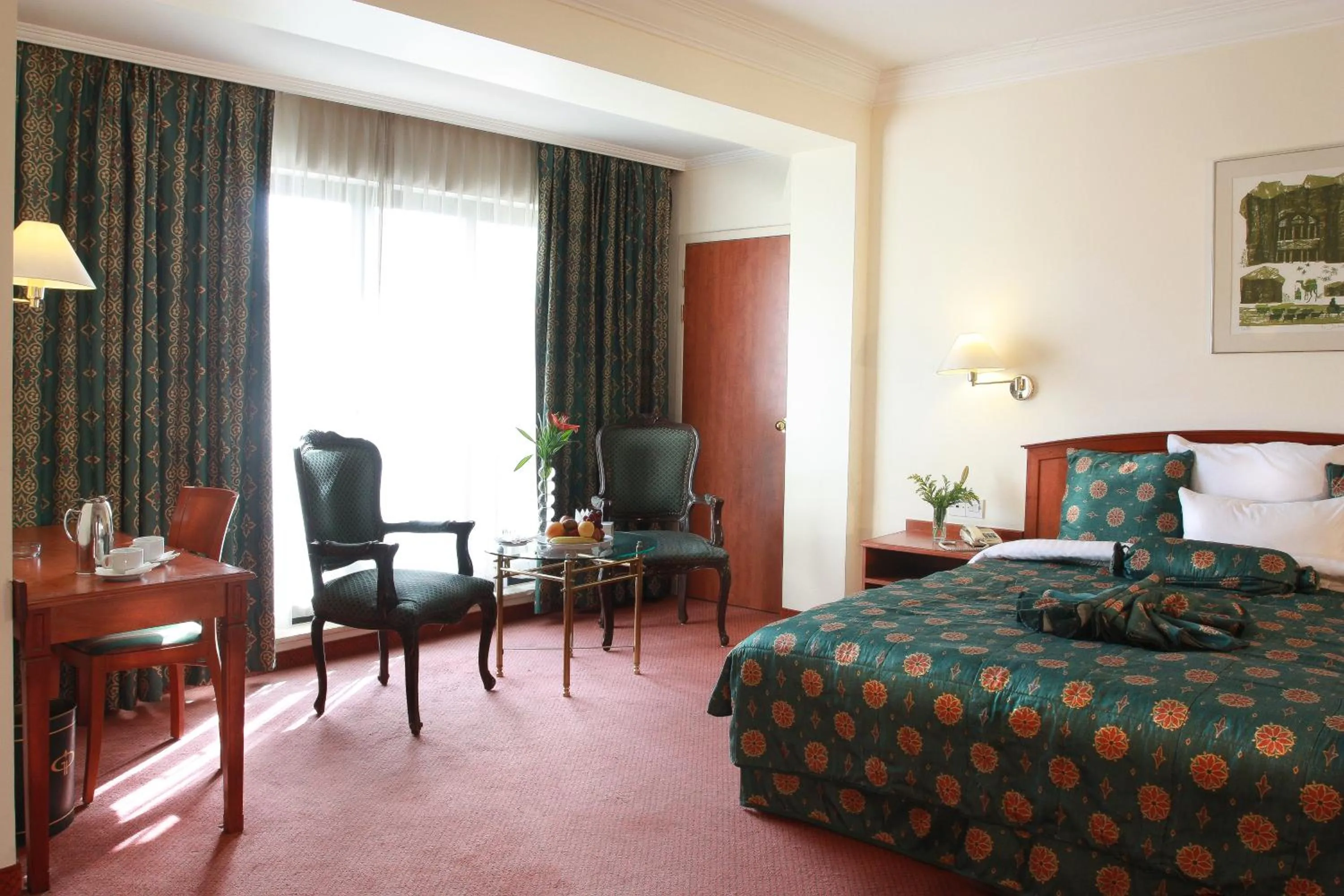 Bed in Grand Palace Hotel