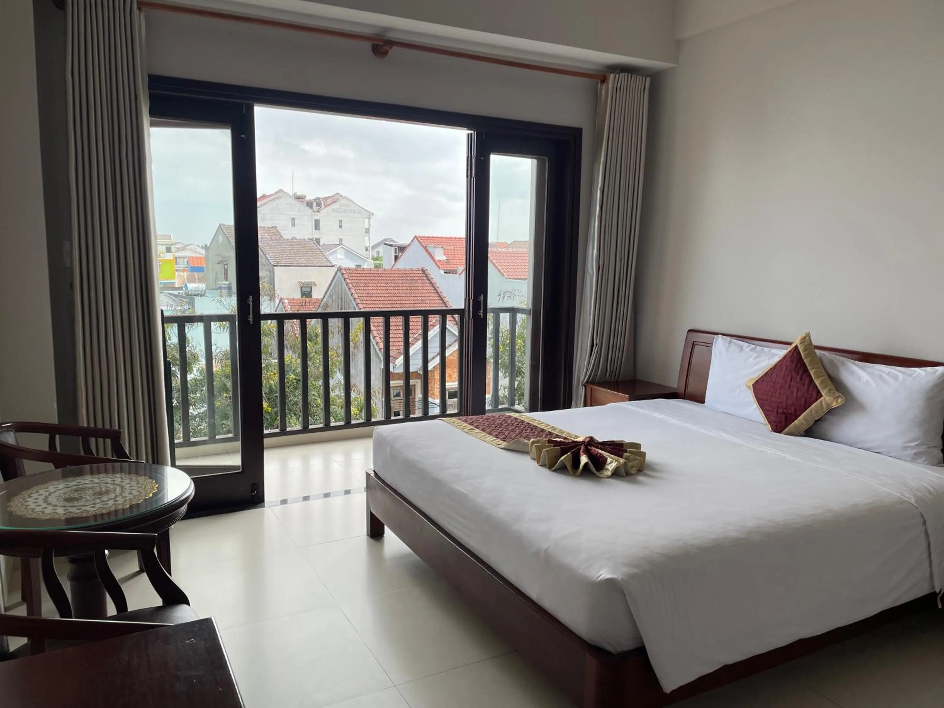 Bed in Sunshine Hoian Hotel