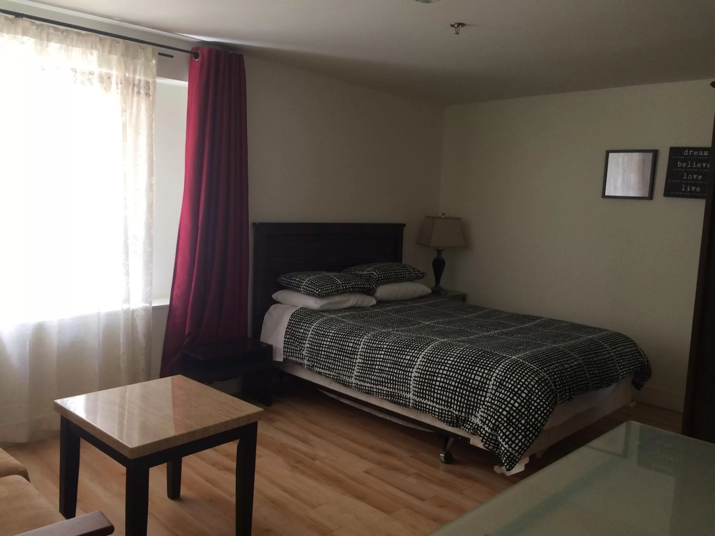 Bed in Black Rooster Guesthouse