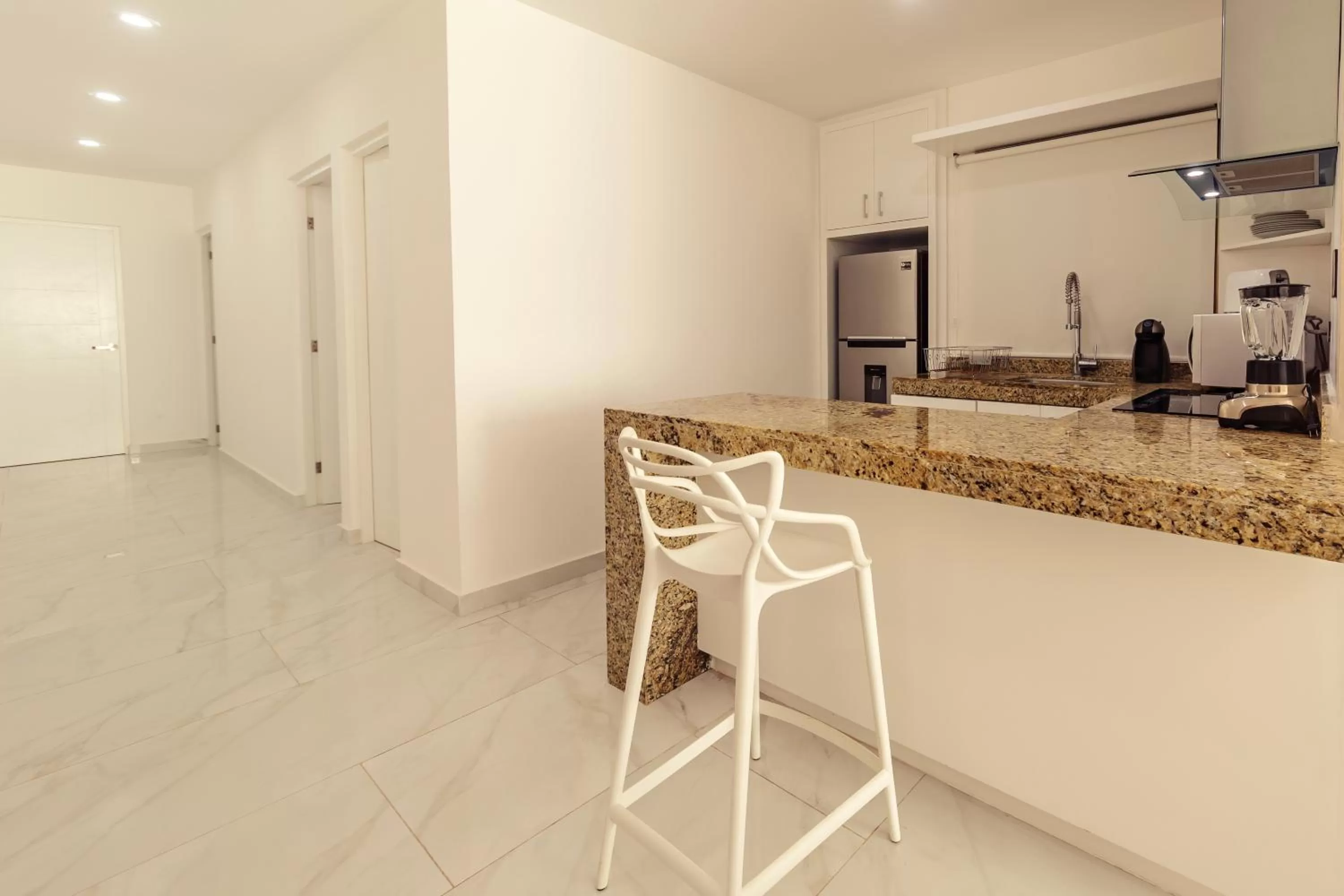 Kitchen or kitchenette in Mararena Family Apartments & Long Stay Living - Steps from 5th Avenue