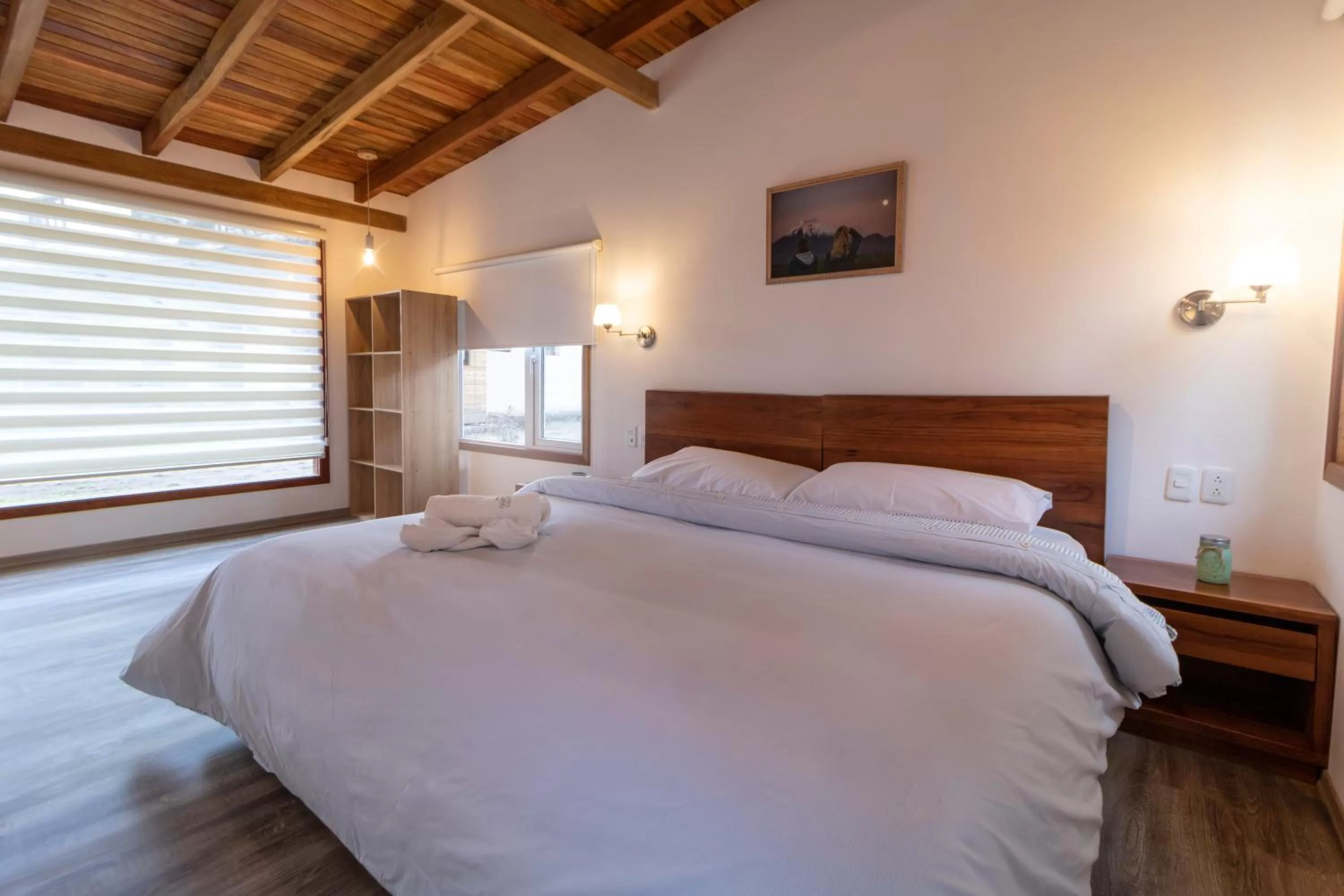 Bed in Hosteria Papagayo Cotopaxi