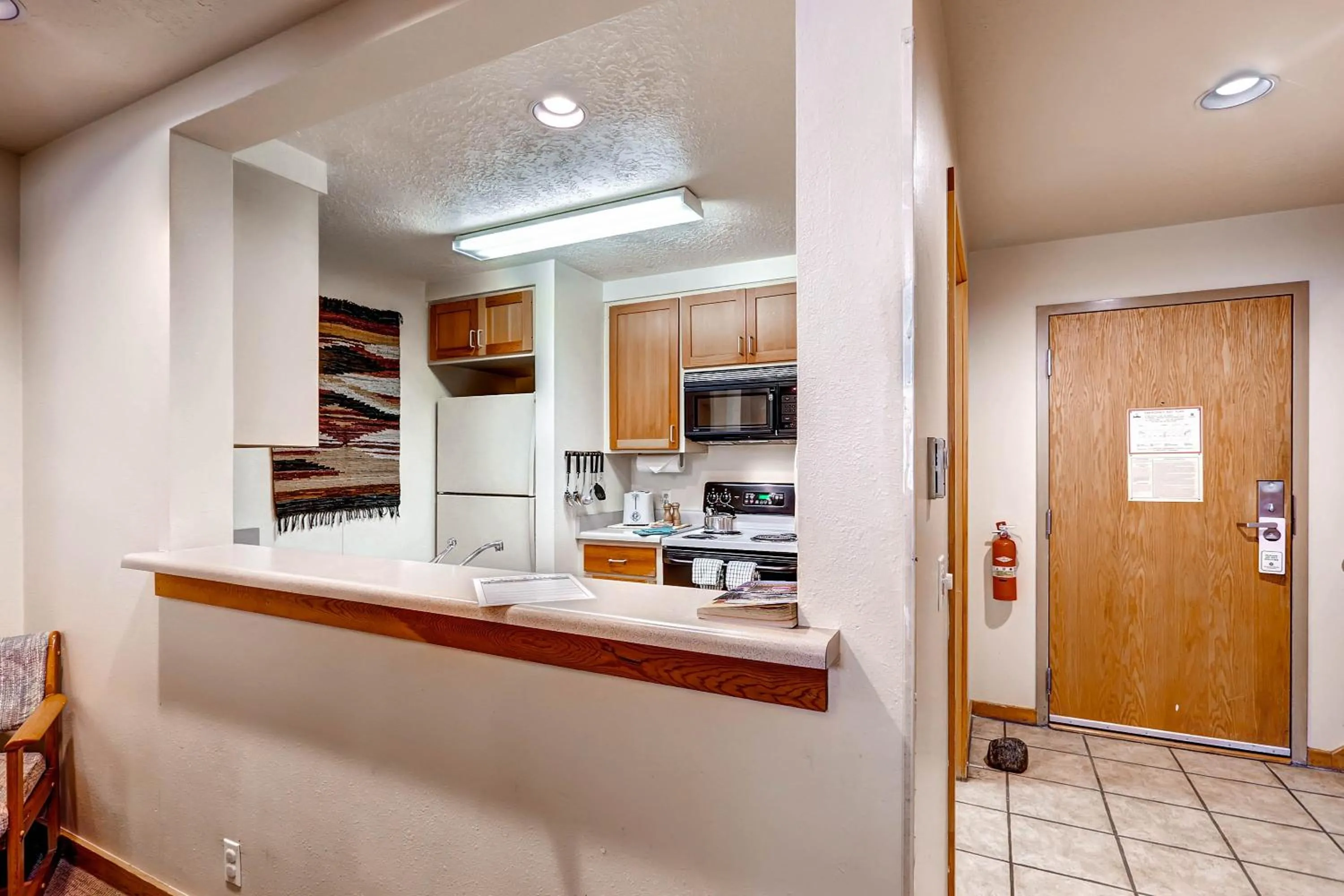 Kitchen or kitchenette in Evergreen Condominiums by Vail Resorts