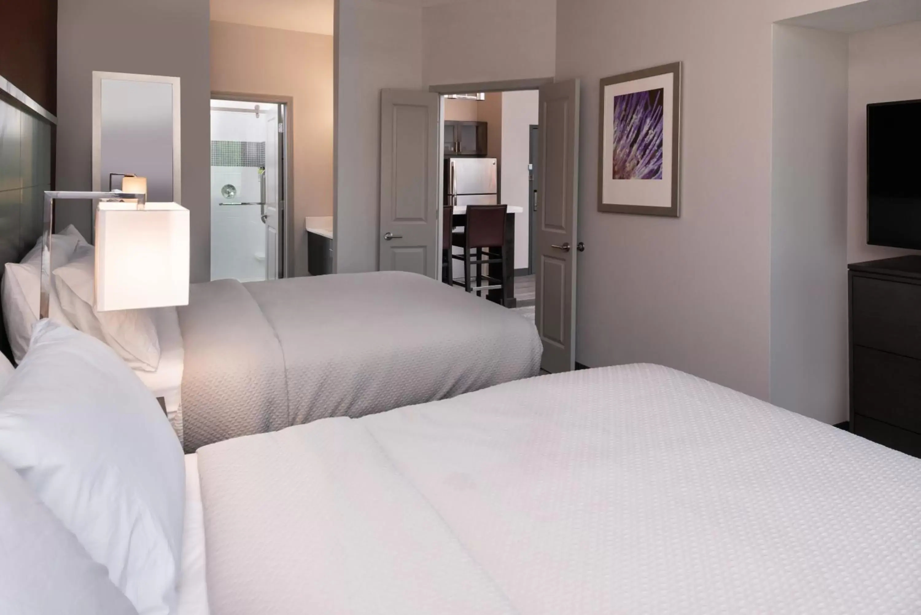 One-Bedroom Queen Room with Two Queen Beds and Mobility Accessible Tub - Non-Smoking in Staybridge Suites - Lake Charles by IHG One-Bedroom Queen Room with Two Queen Beds and Mobility Accessible Tub - Non-Smoking in Staybridge Suites - Lake Charles by IHG