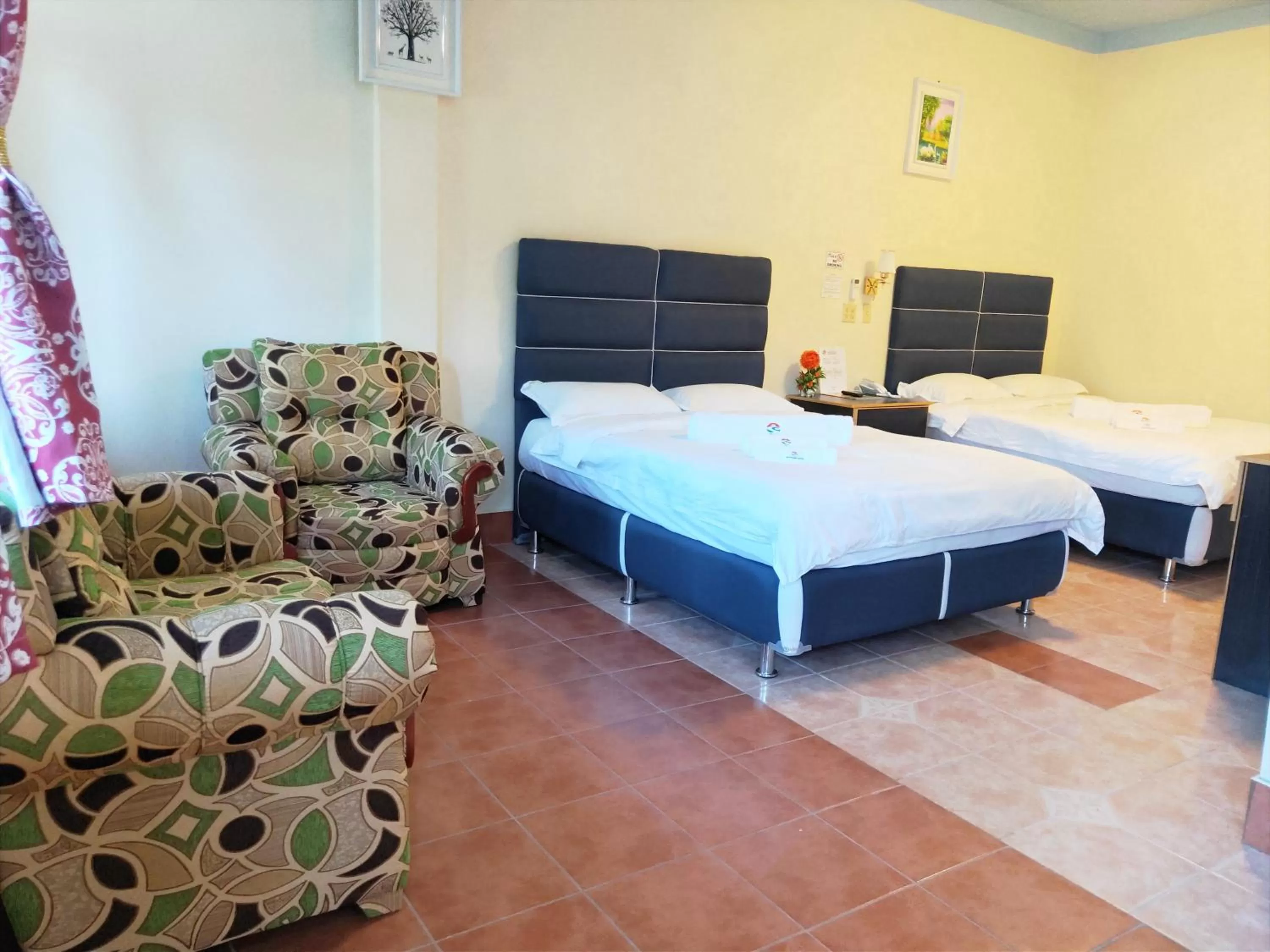 Bed in Sunshine View Hotel and Restaurant