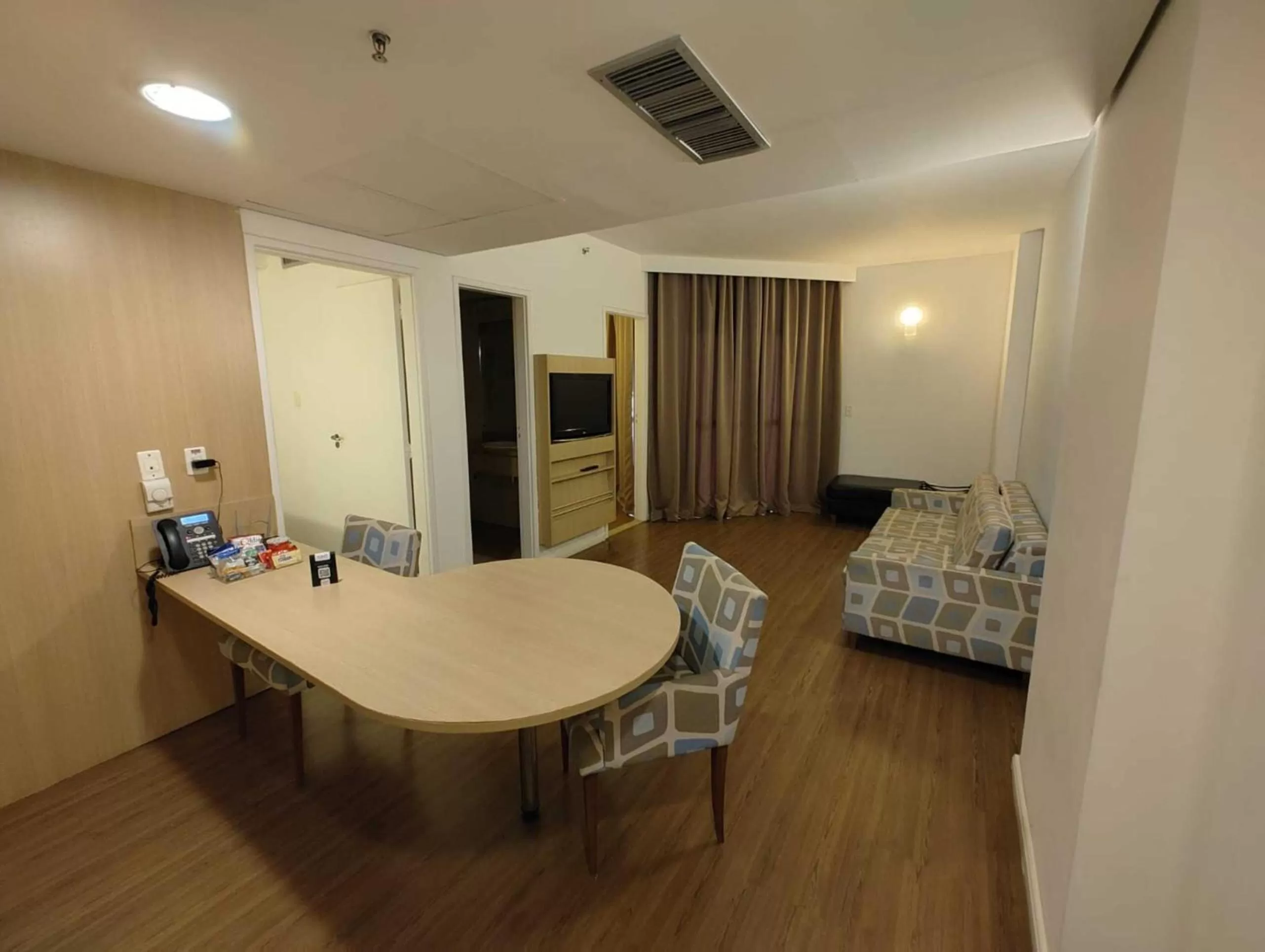 Bedroom, Seating Area in Summit Suítes Hotel Santos