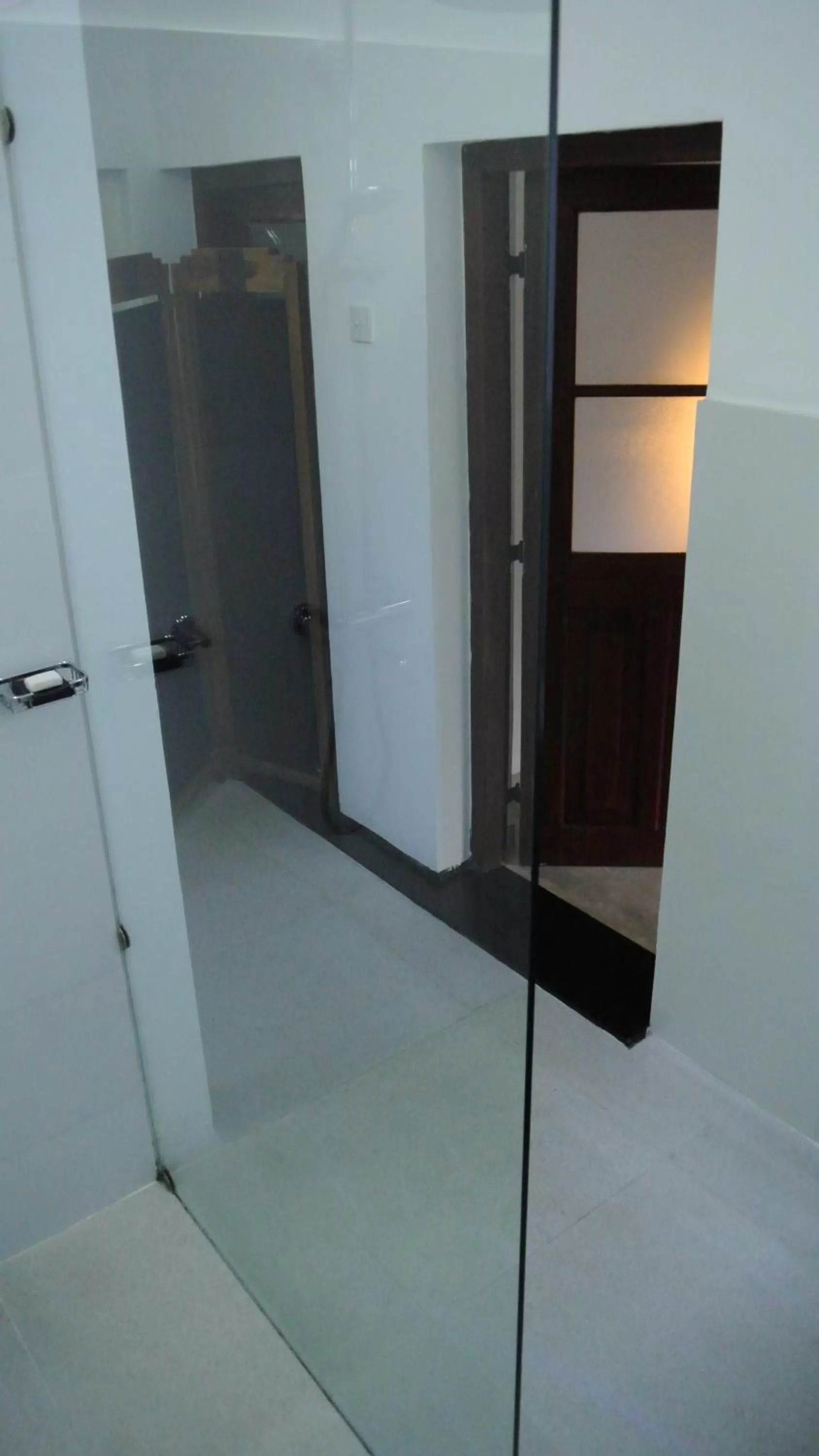 Bathroom in "27" Spathodea- Oasis in the City