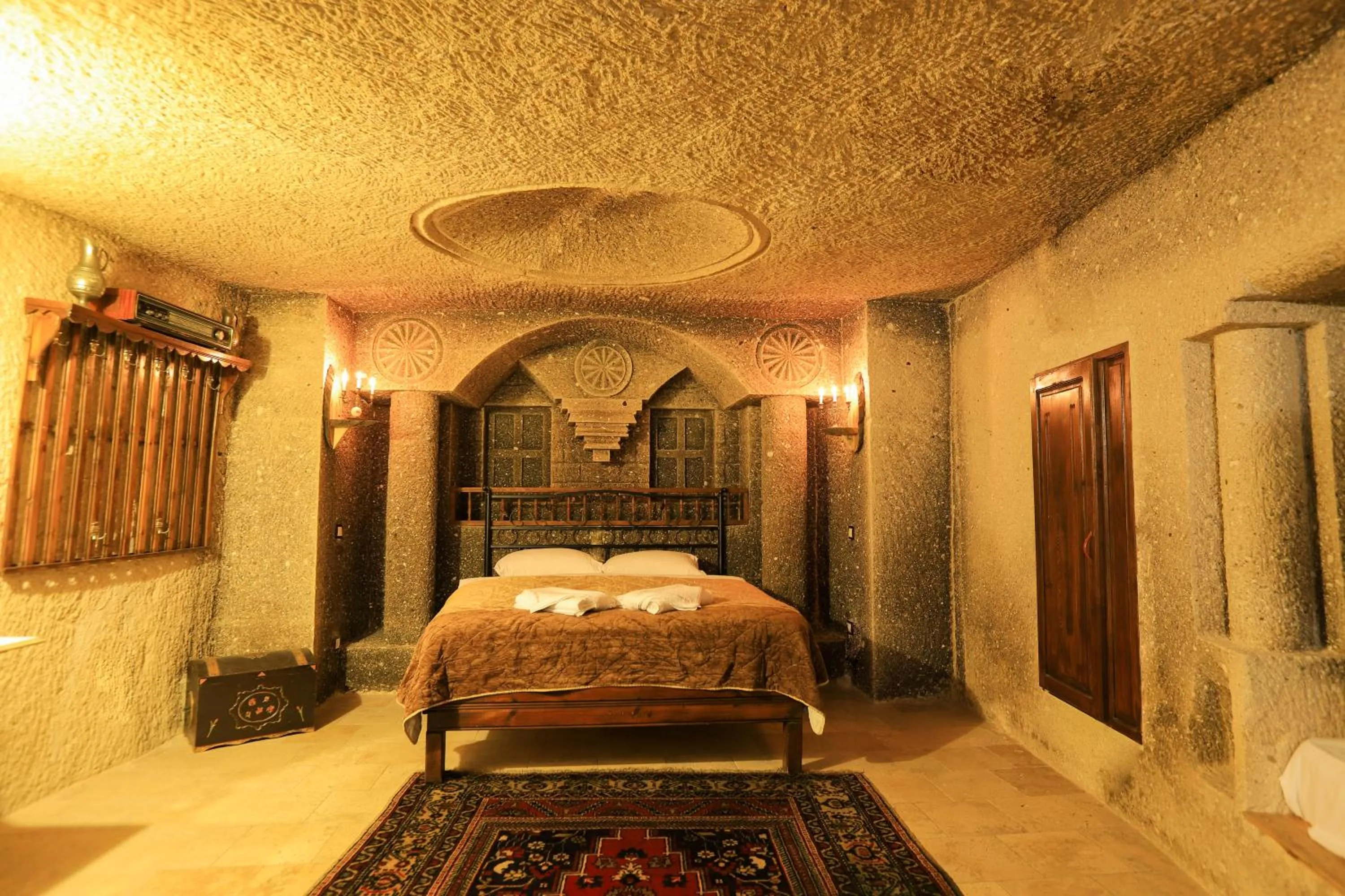 Property building, Bed in Antique Terrace Cave Suites