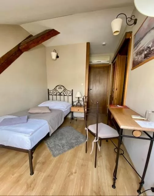 Bed in Hotel and restaurant Via Ironia