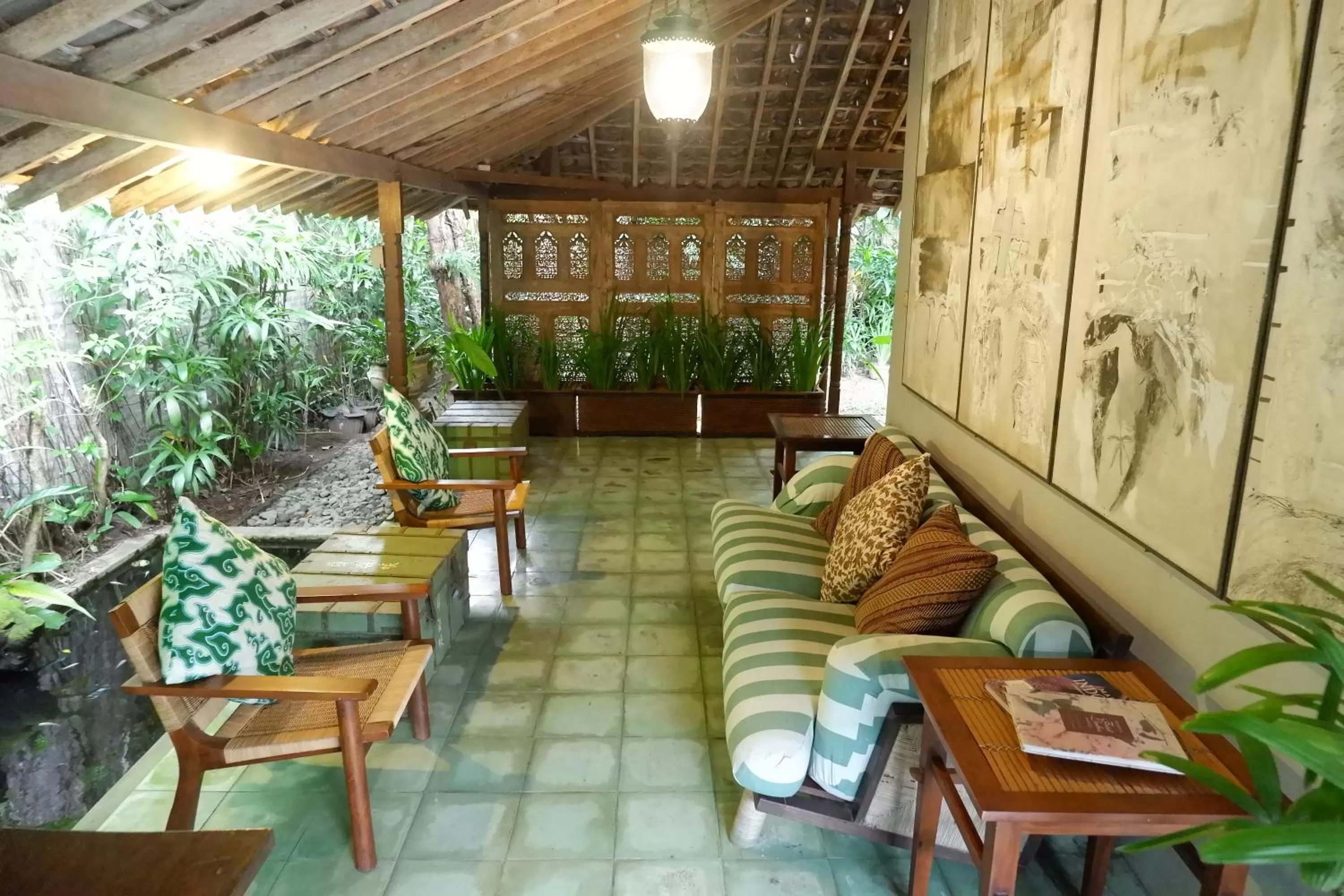 Seating area in D'omah Yogya Hotel