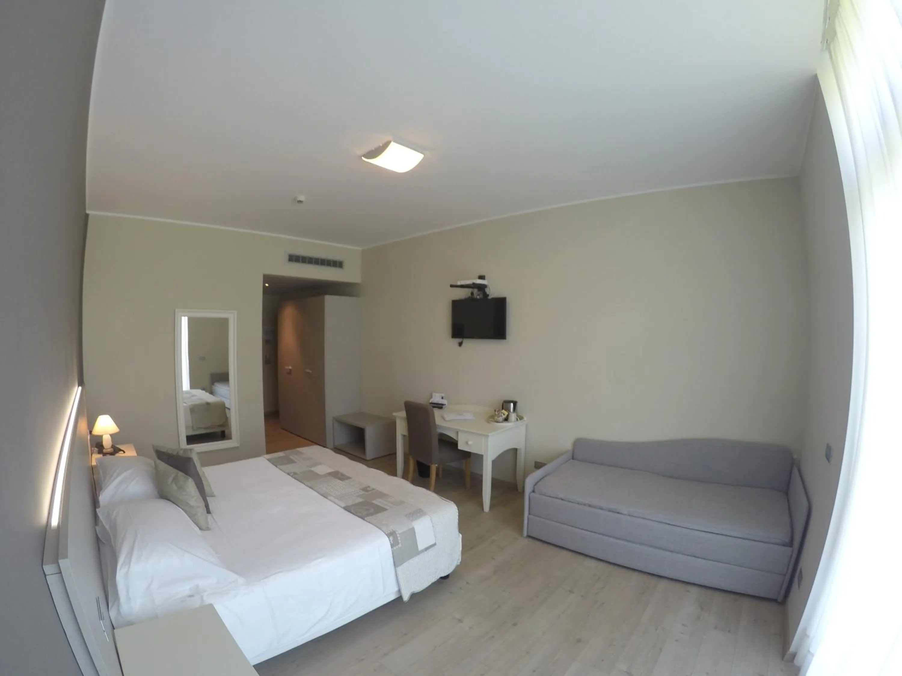 Photo of the whole room, Bed in Tullio Hotel