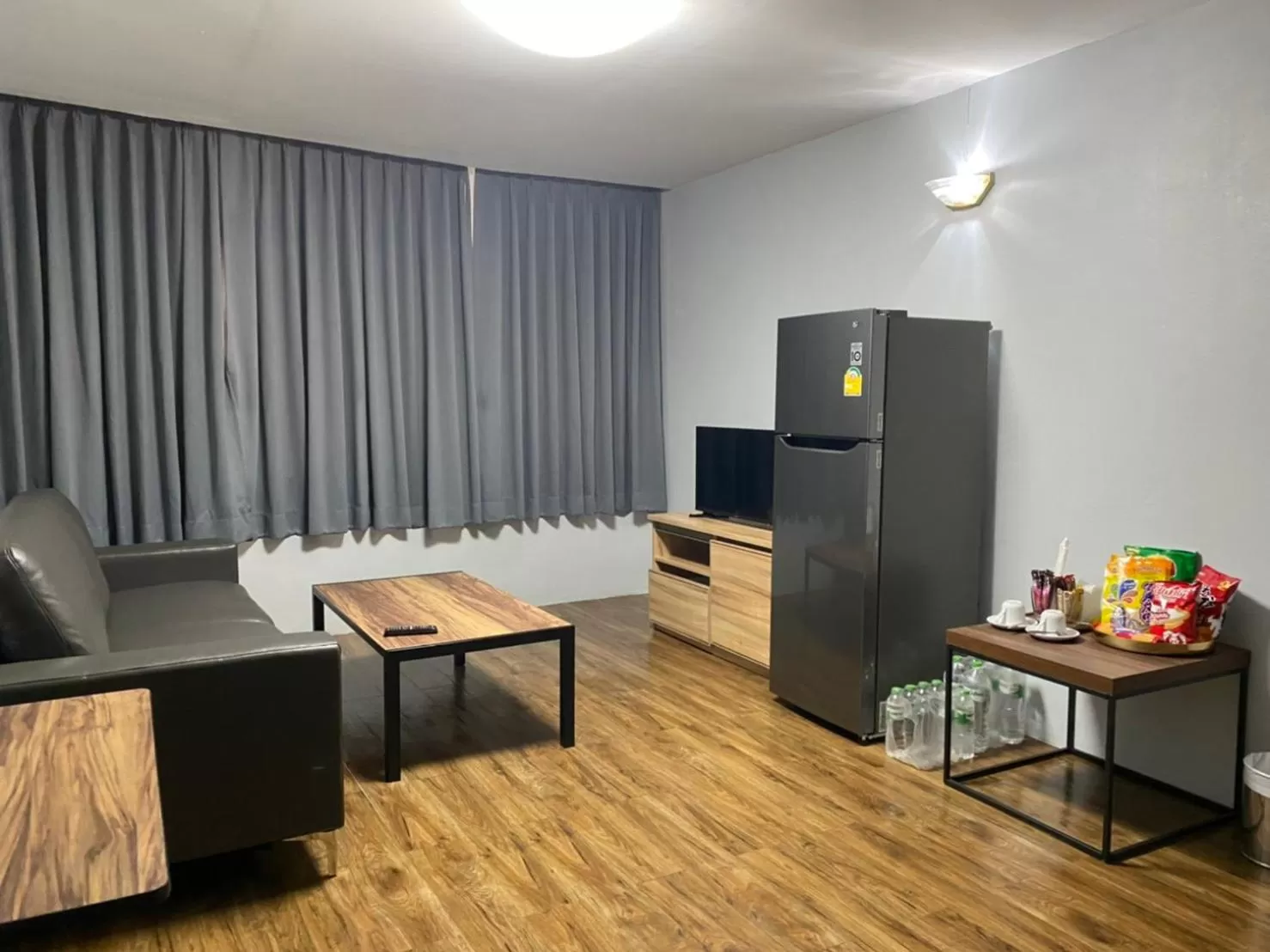 Communal lounge/ TV room, TV/Entertainment Center in City Residence