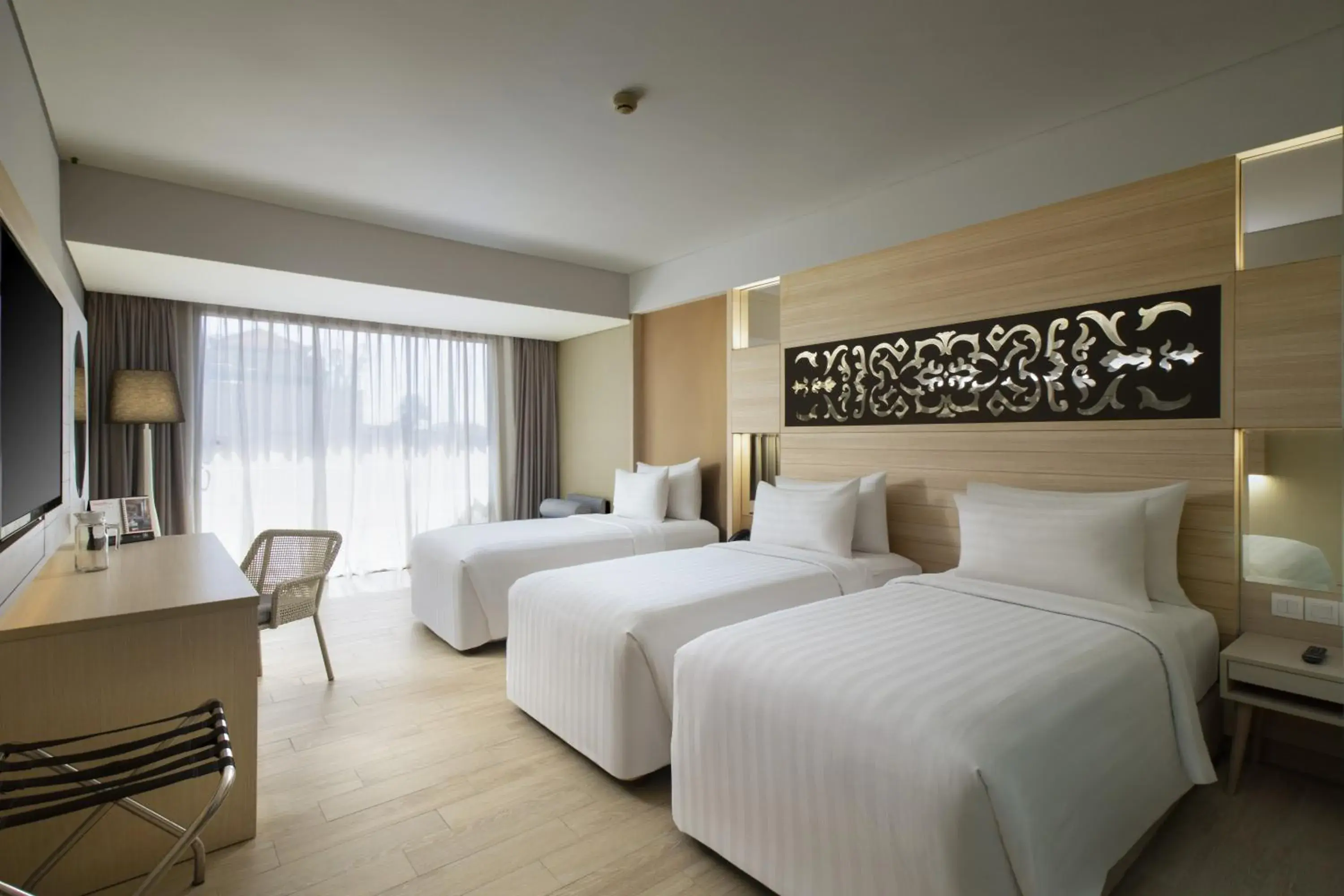 Triple Room City View in Swiss-Belhotel Tuban Bali Triple Room City View in Swiss-Belhotel Tuban Bali