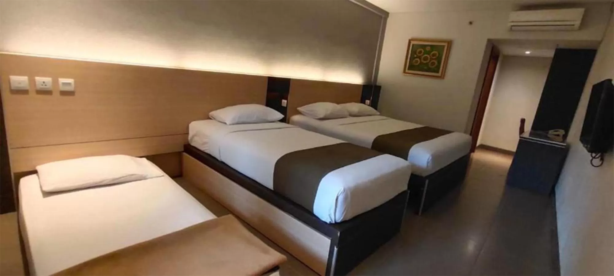 Bed in Sukajadi Hotel, Convention and Gallery