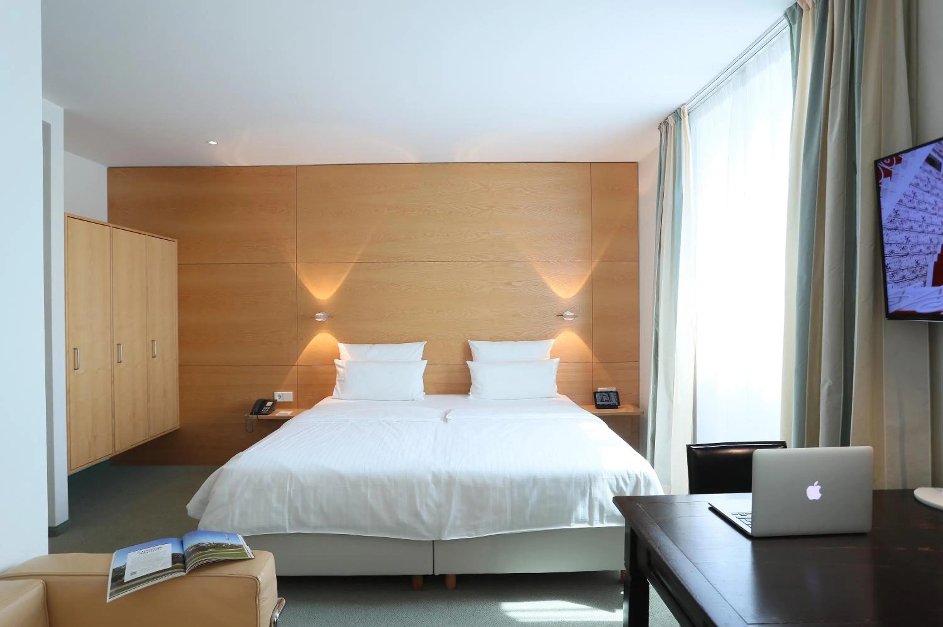 Bed in MOMA1890 Boutique Hotel