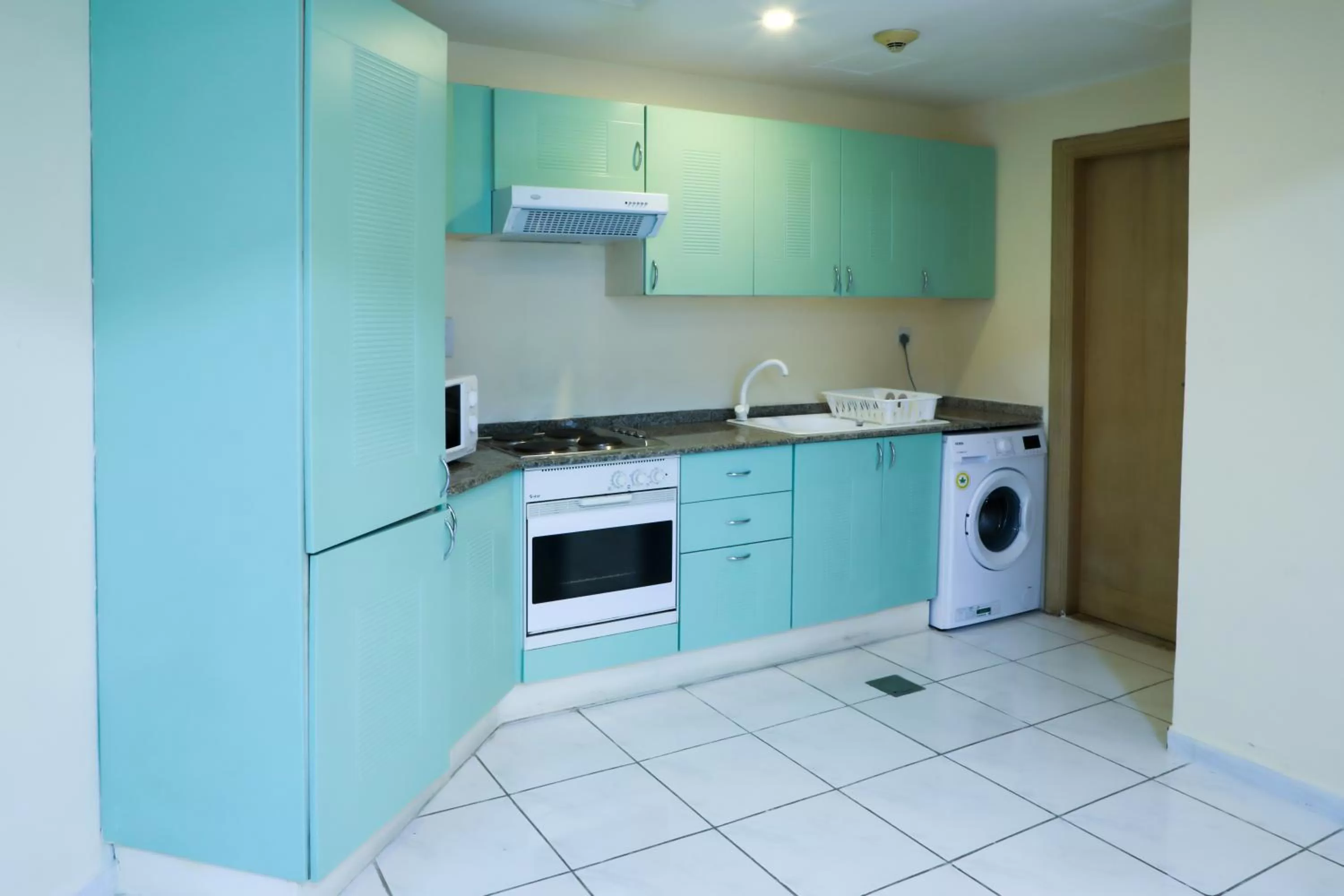 kitchen in West Zone Pearl Hotel Apartment