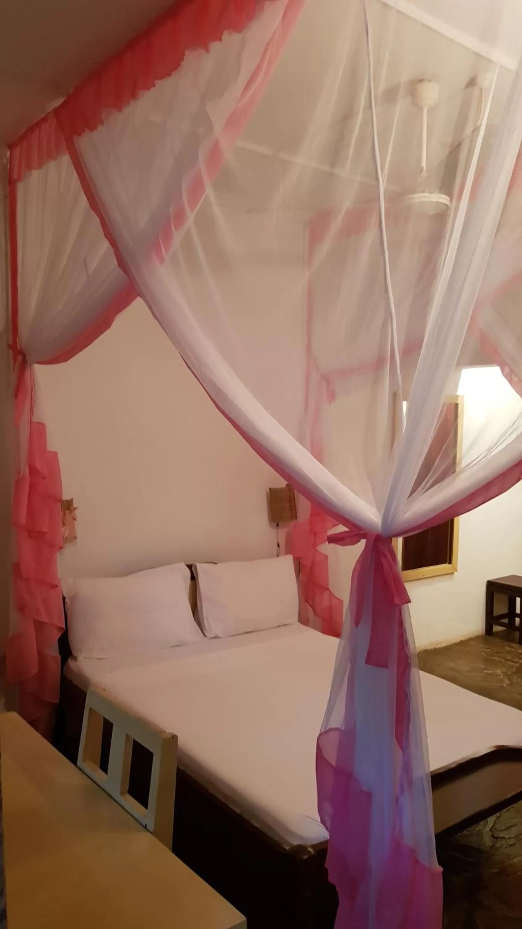 Bed in Makuti Villas Resort