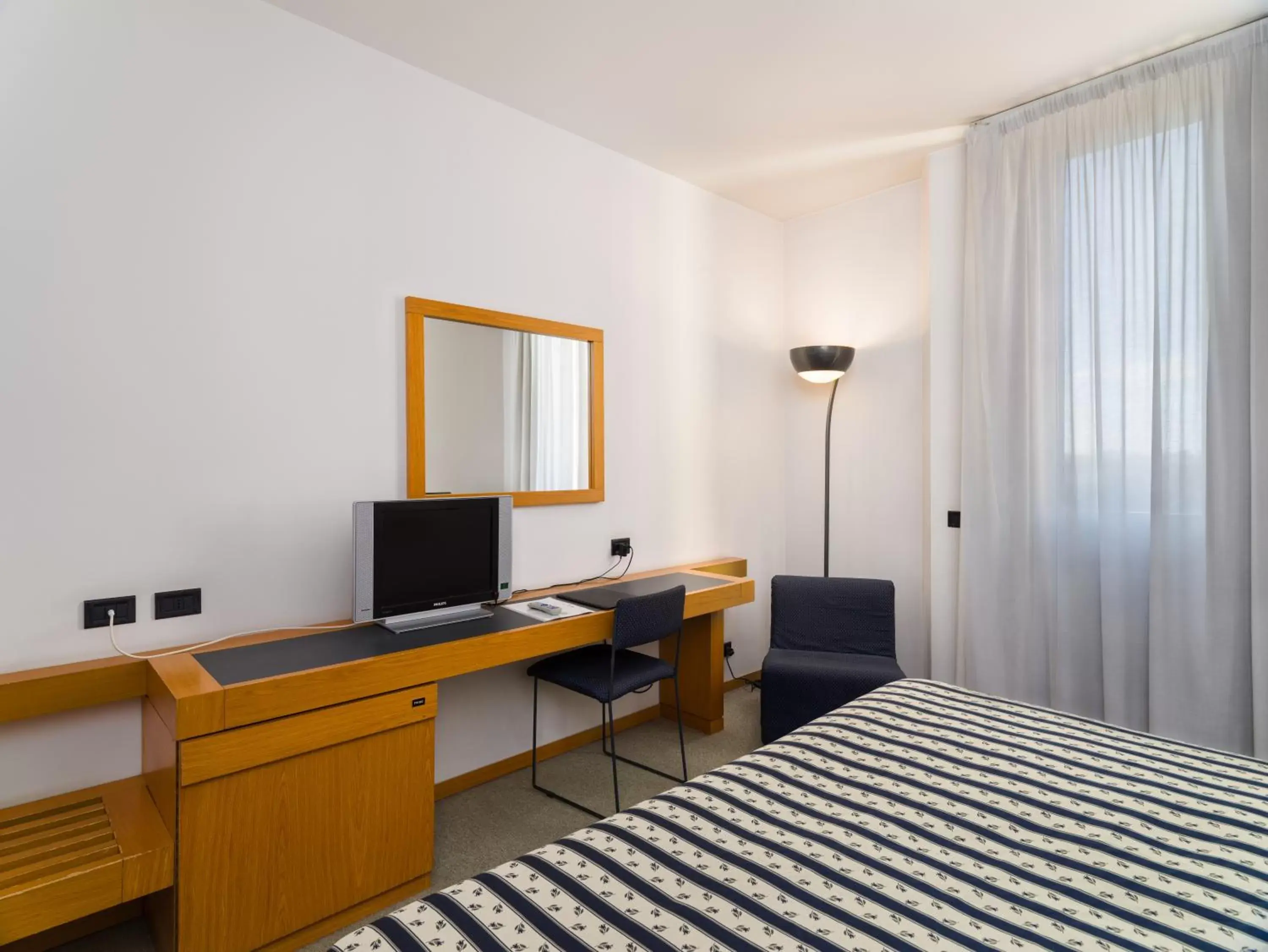 Quadruple Room in Grand Hotel Tiziano E Dei Congressi Quadruple Room in Grand Hotel Tiziano E Dei Congressi