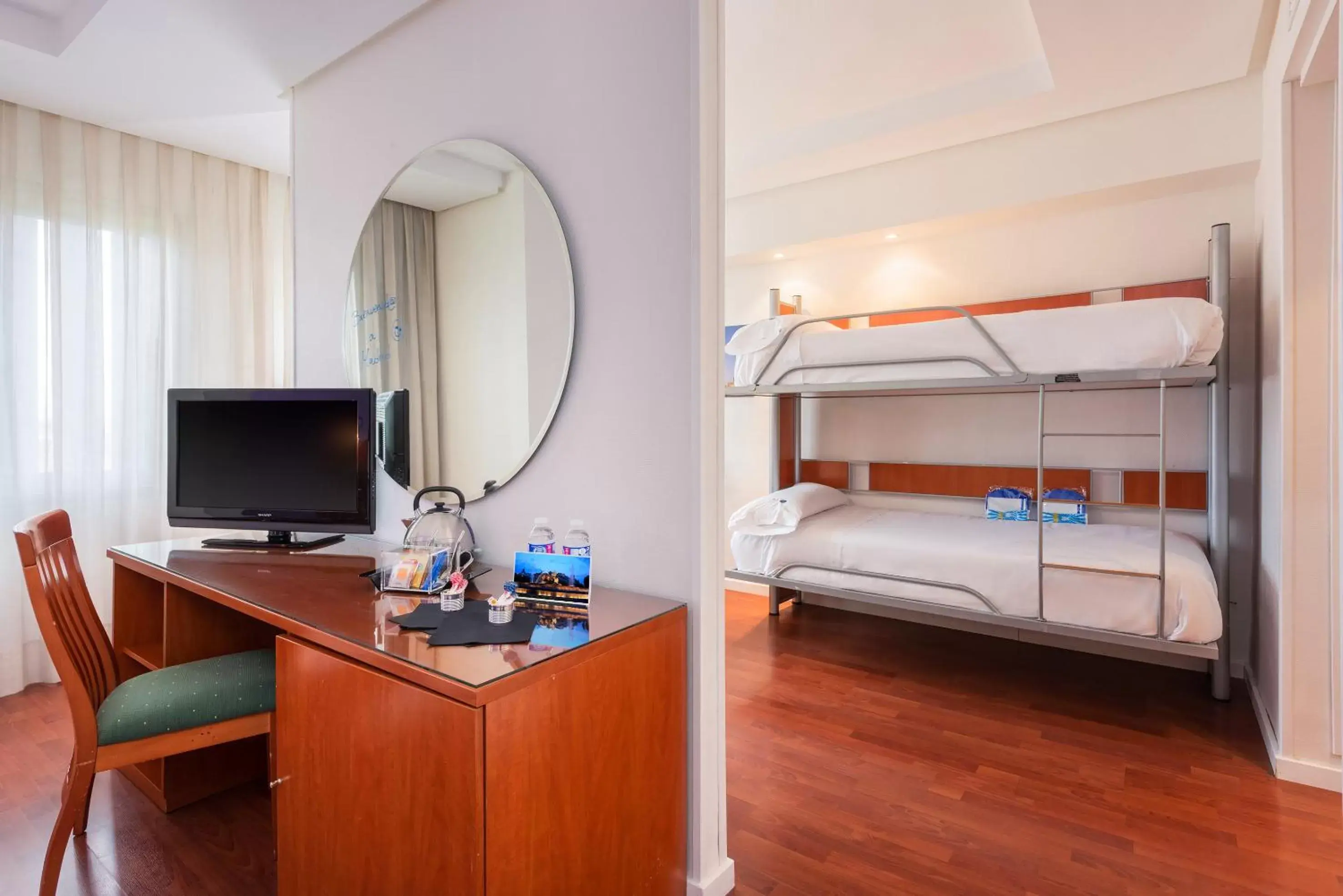 Family Room (2 Adults + 2 Children) in Hotel Madrid Chamartín, Affiliated by Meliá Family Room (2 Adults + 2 Children) in Hotel Madrid Chamartín, Affiliated by Meliá