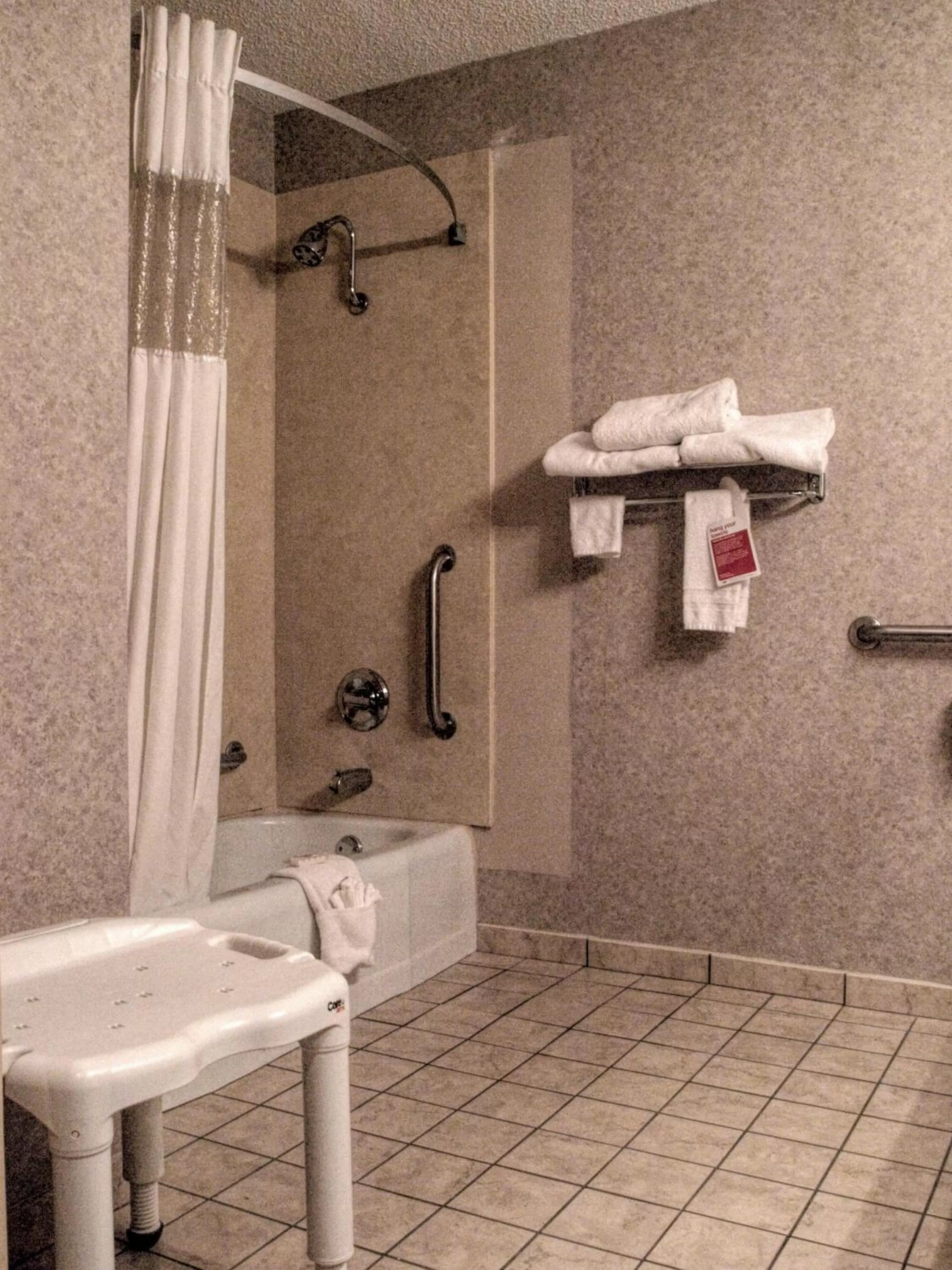 Shower in Ramada by Wyndham Topeka Downtown Hotel & Convention Center
