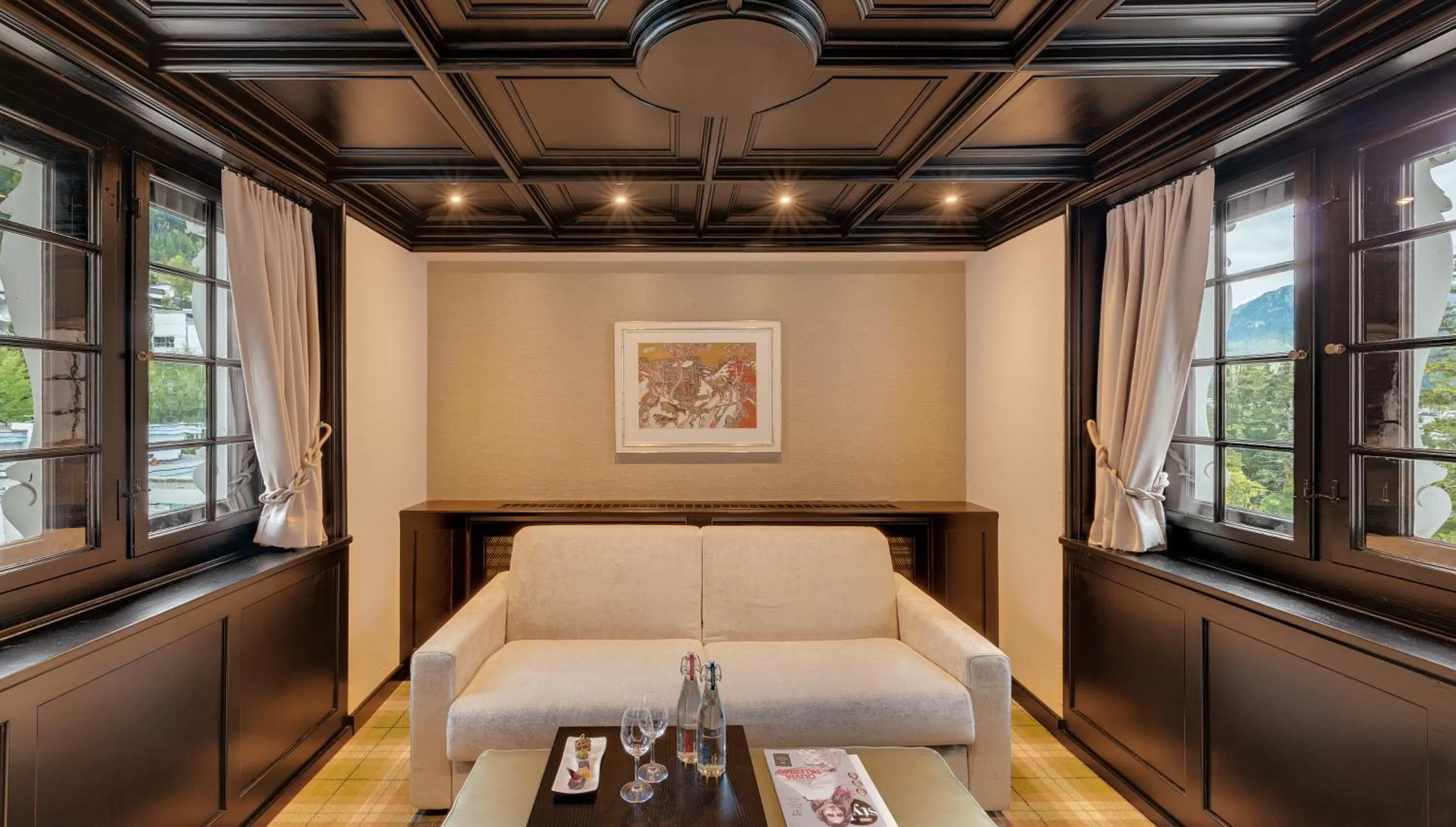 Seating area, Bed in Morosani Schweizerhof