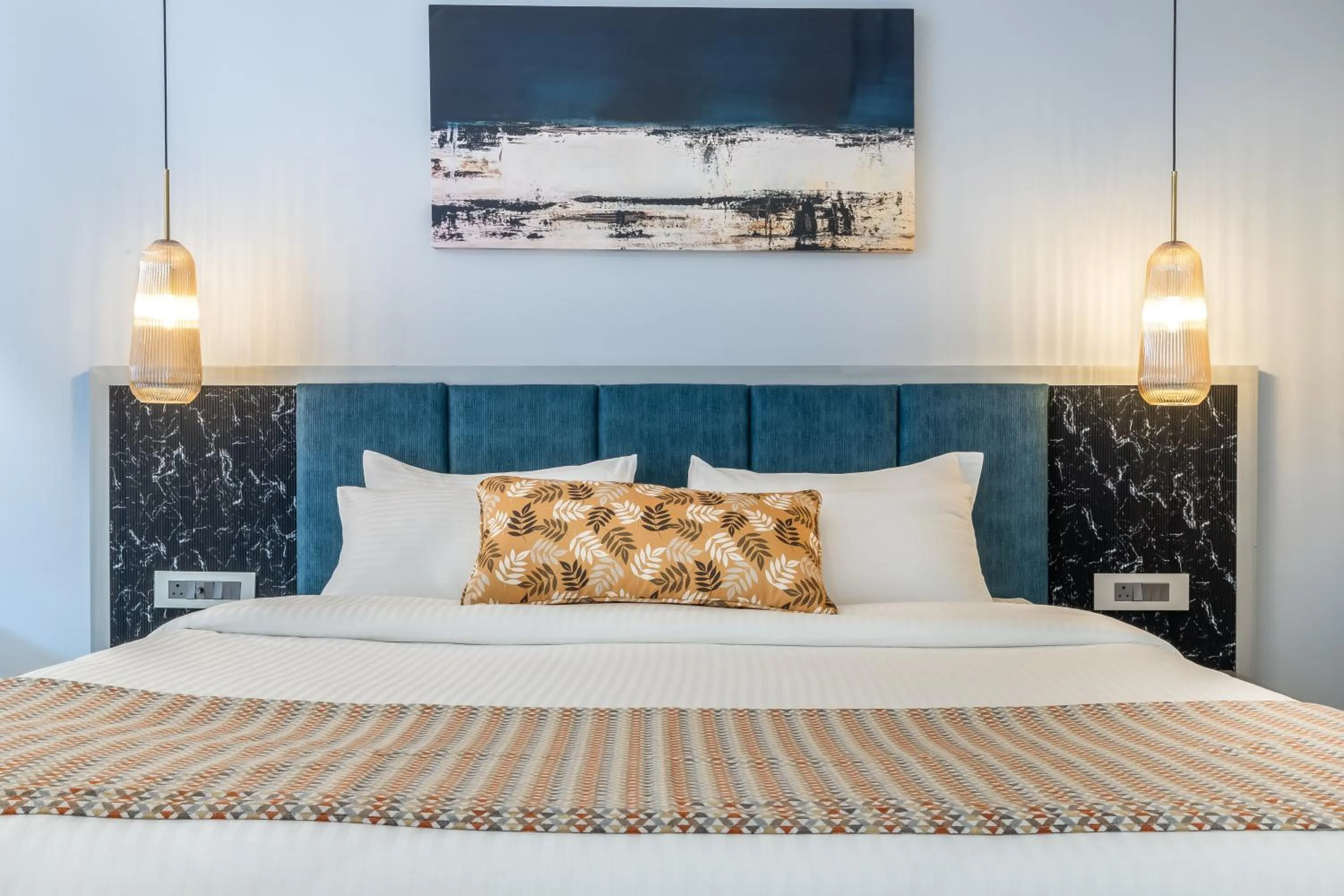 Bed in Clarion Hotel Ocean Palms Goa