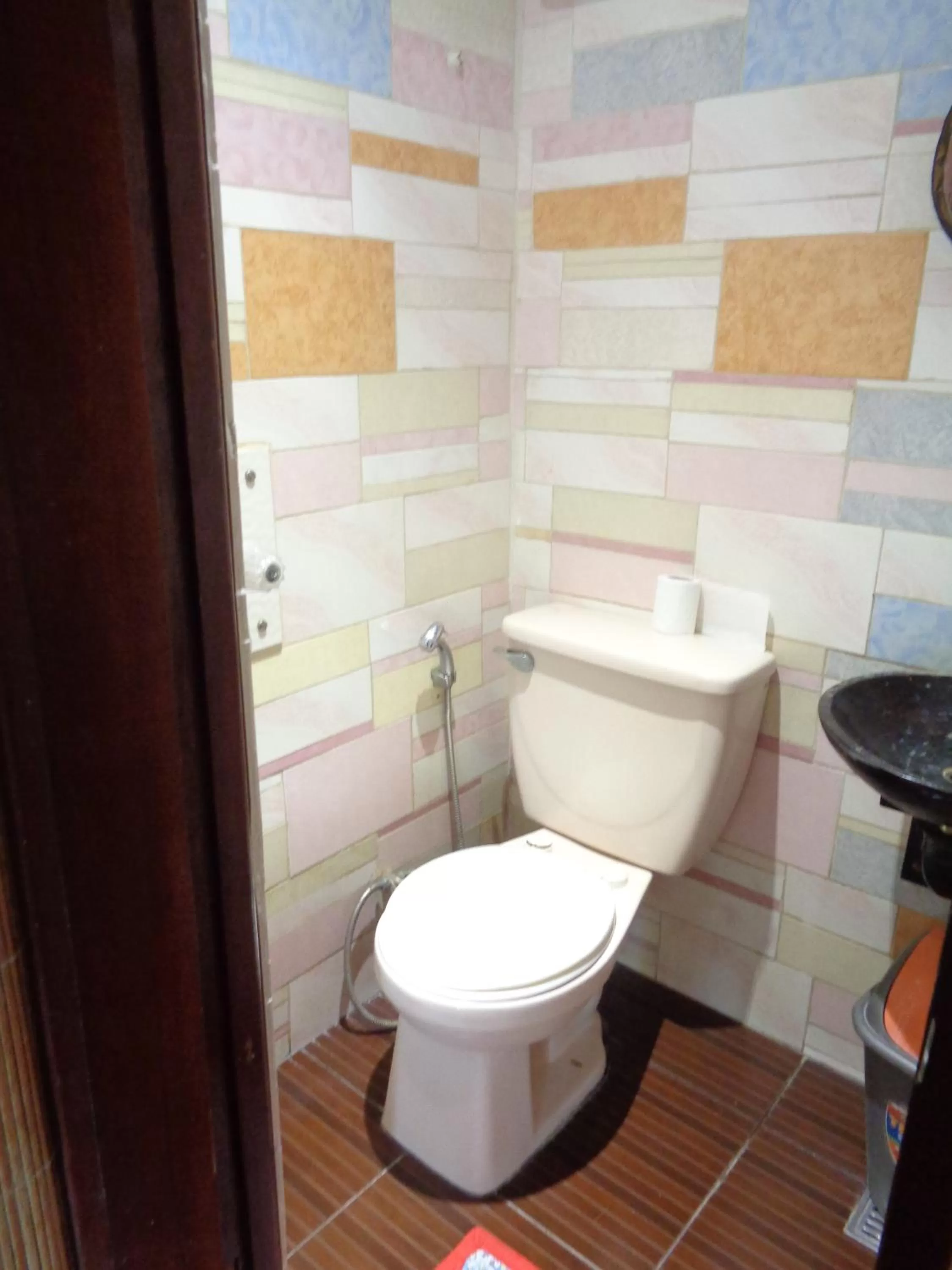 Toilet in Orange Mangrove Pension House by SMS Hospitality