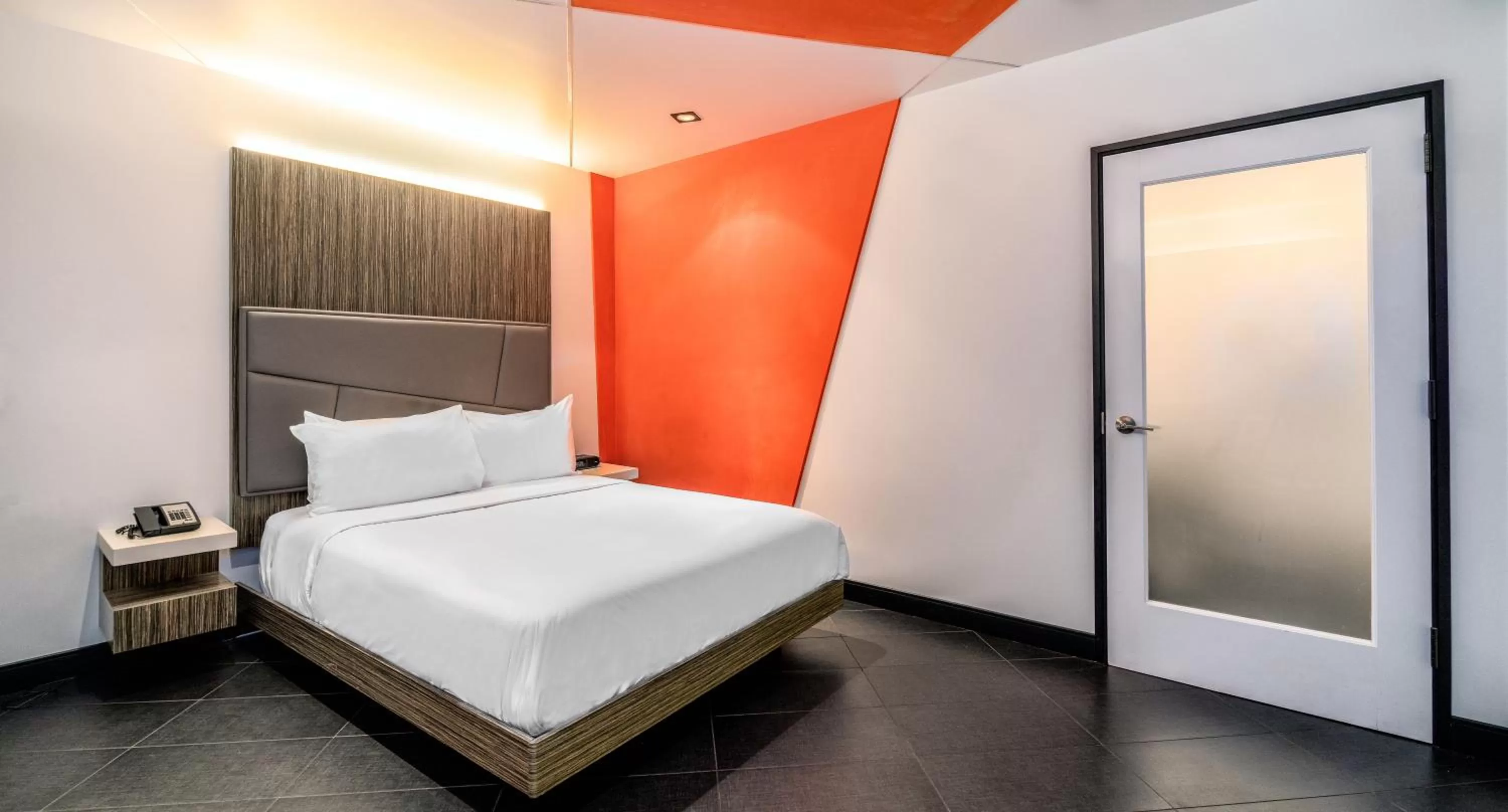 Photo of the whole room, Bed in The Moment Hotel