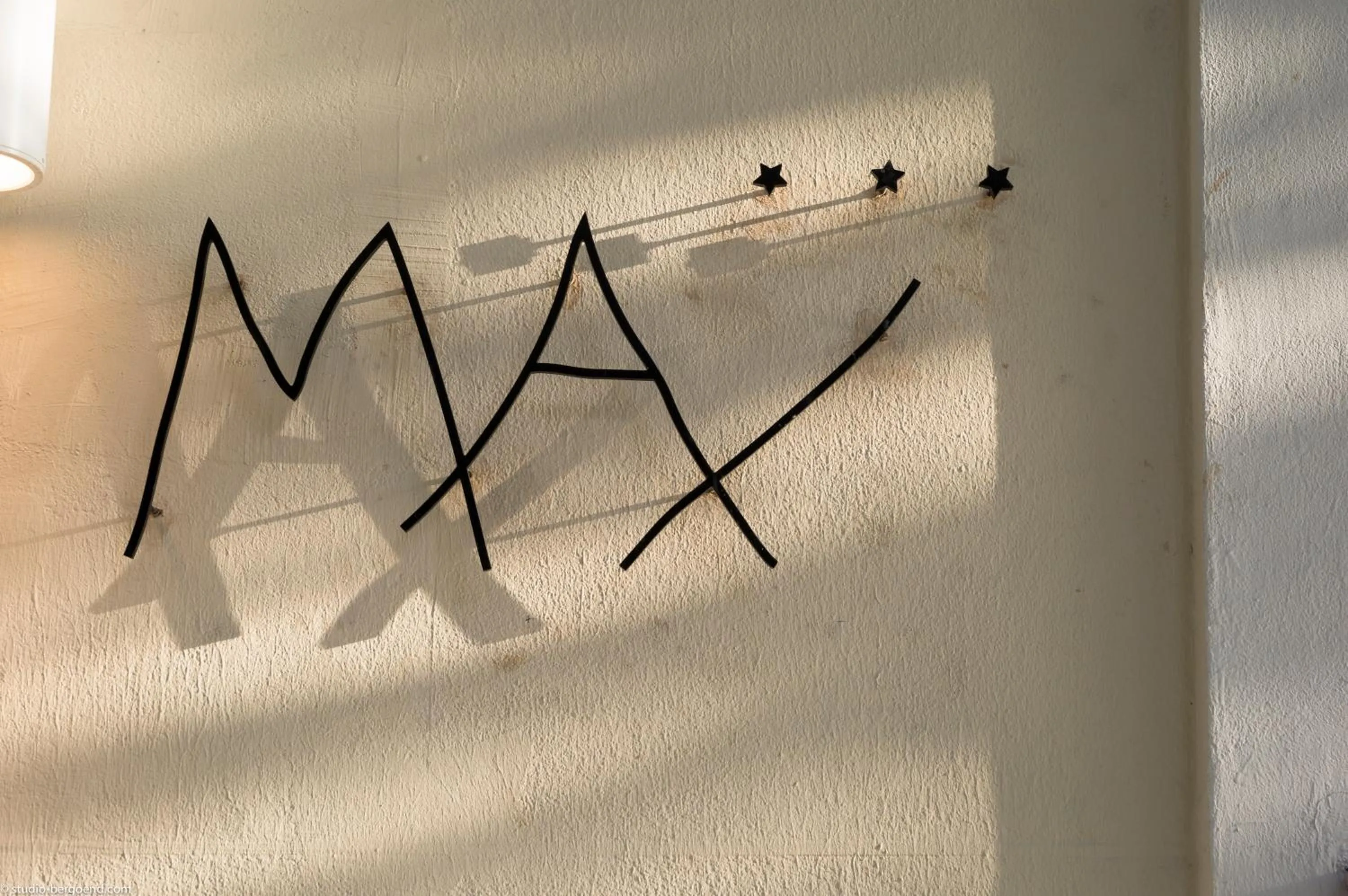 Property logo or sign in Hotel Max