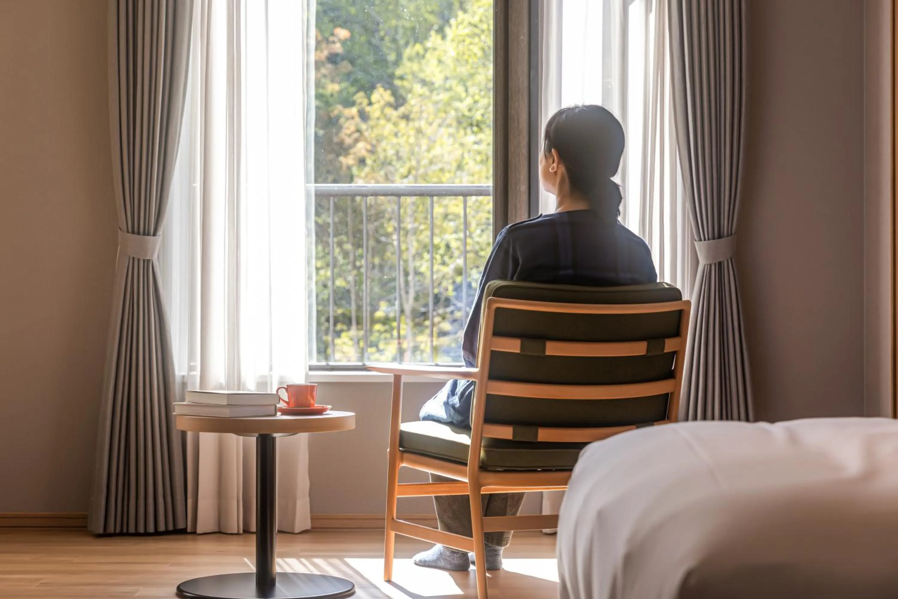 Living room, Bed in Higashikawa Asahidake Onsen Hotel Bear Monte