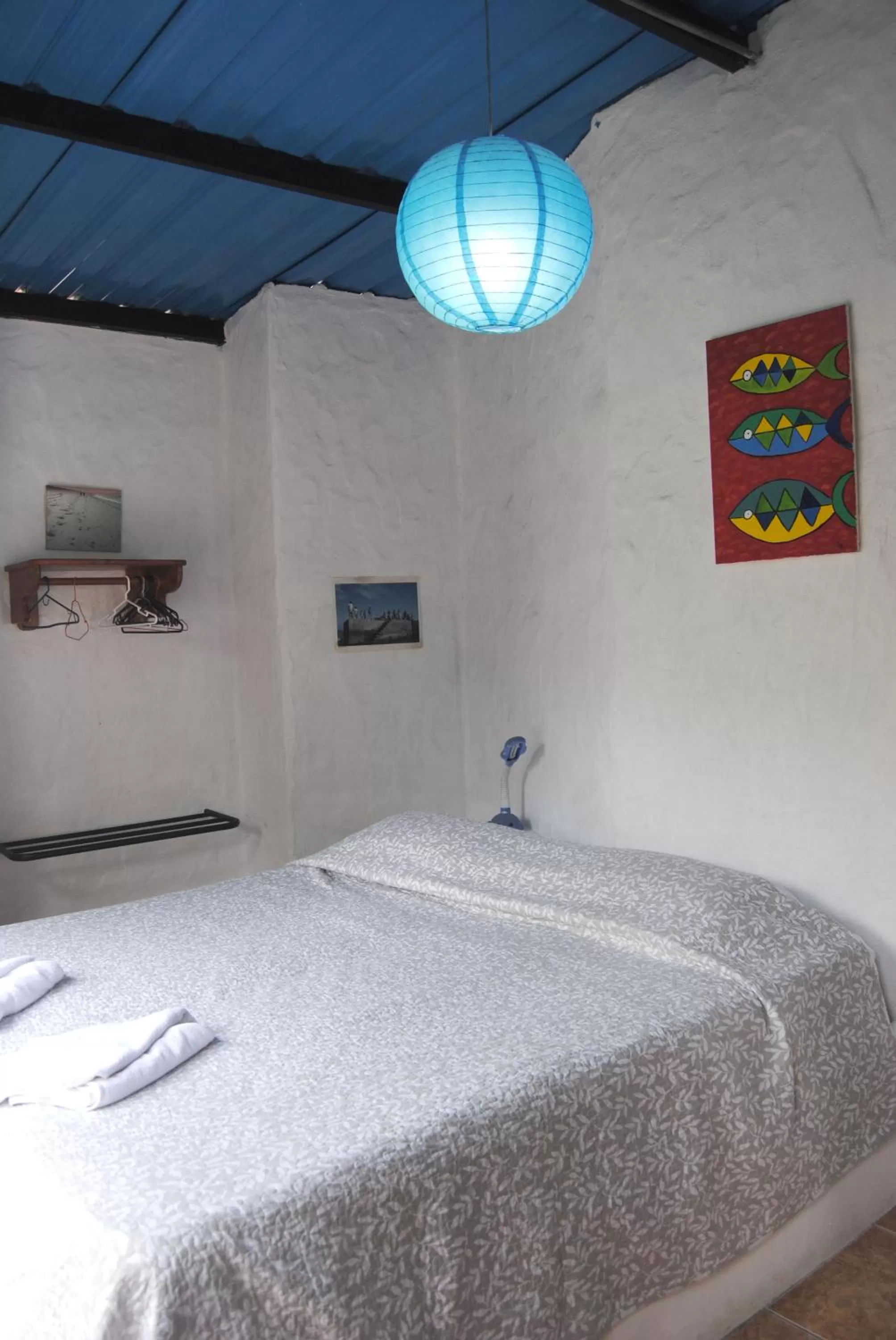 Bed in Hostal Galapagos by Bar de Beto
