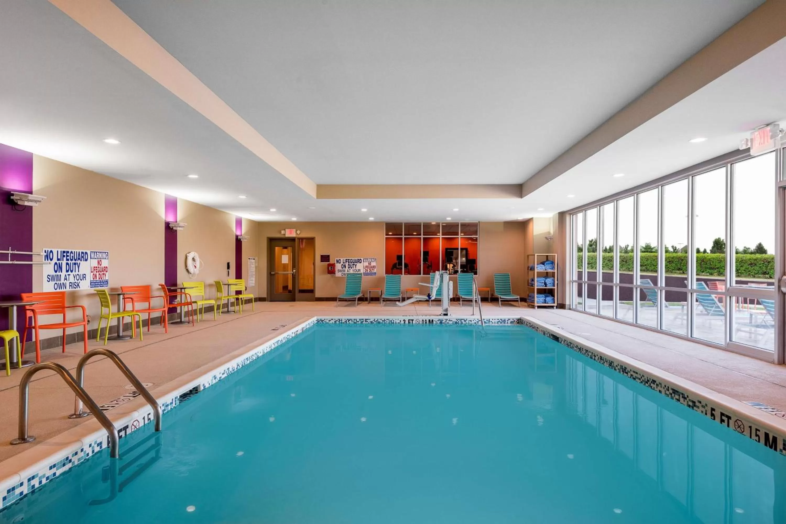 Pool view in Home2 Suites by Hilton Charlotte University Research Park