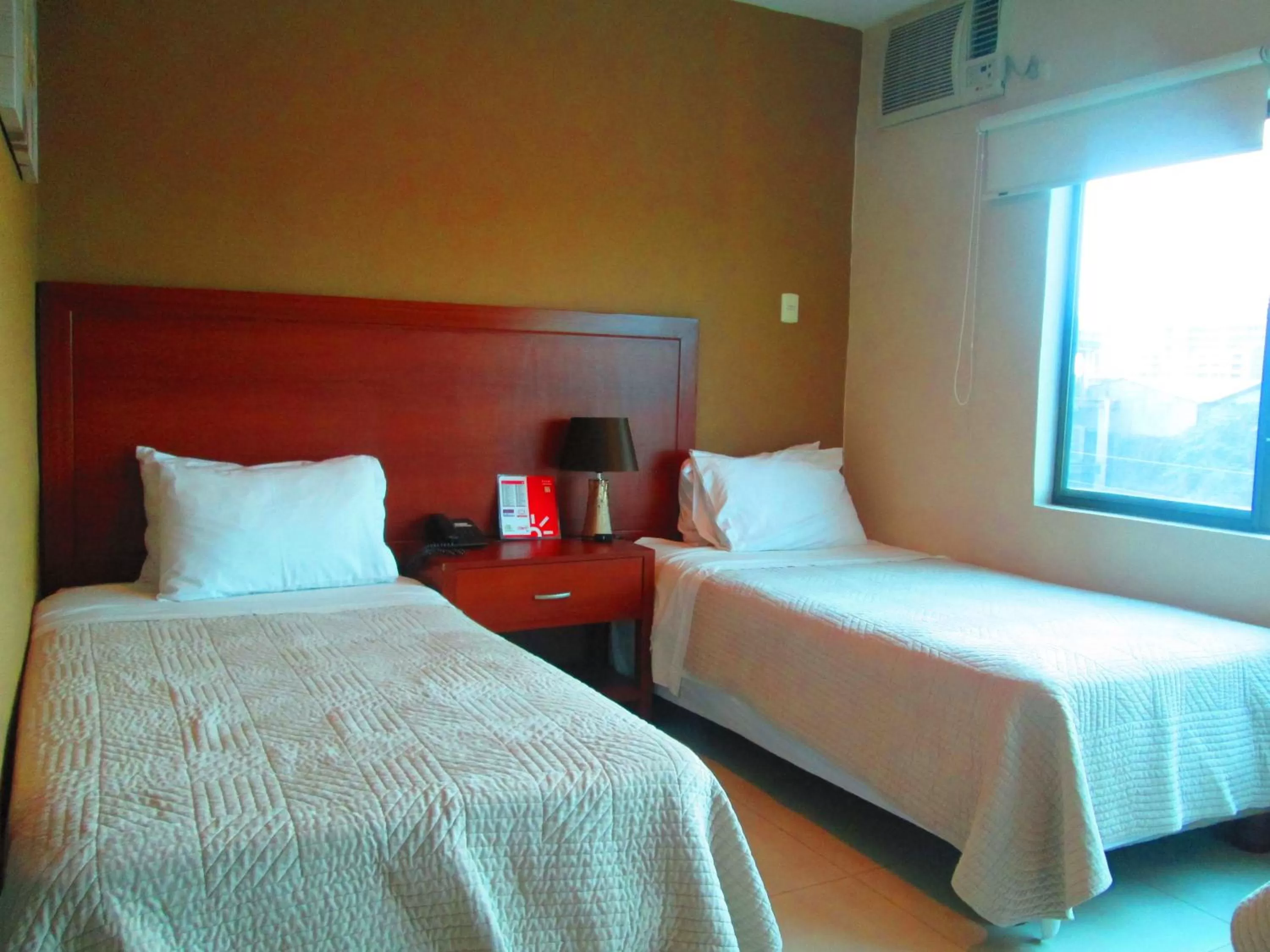 Bed in Hotel Garzota Inn